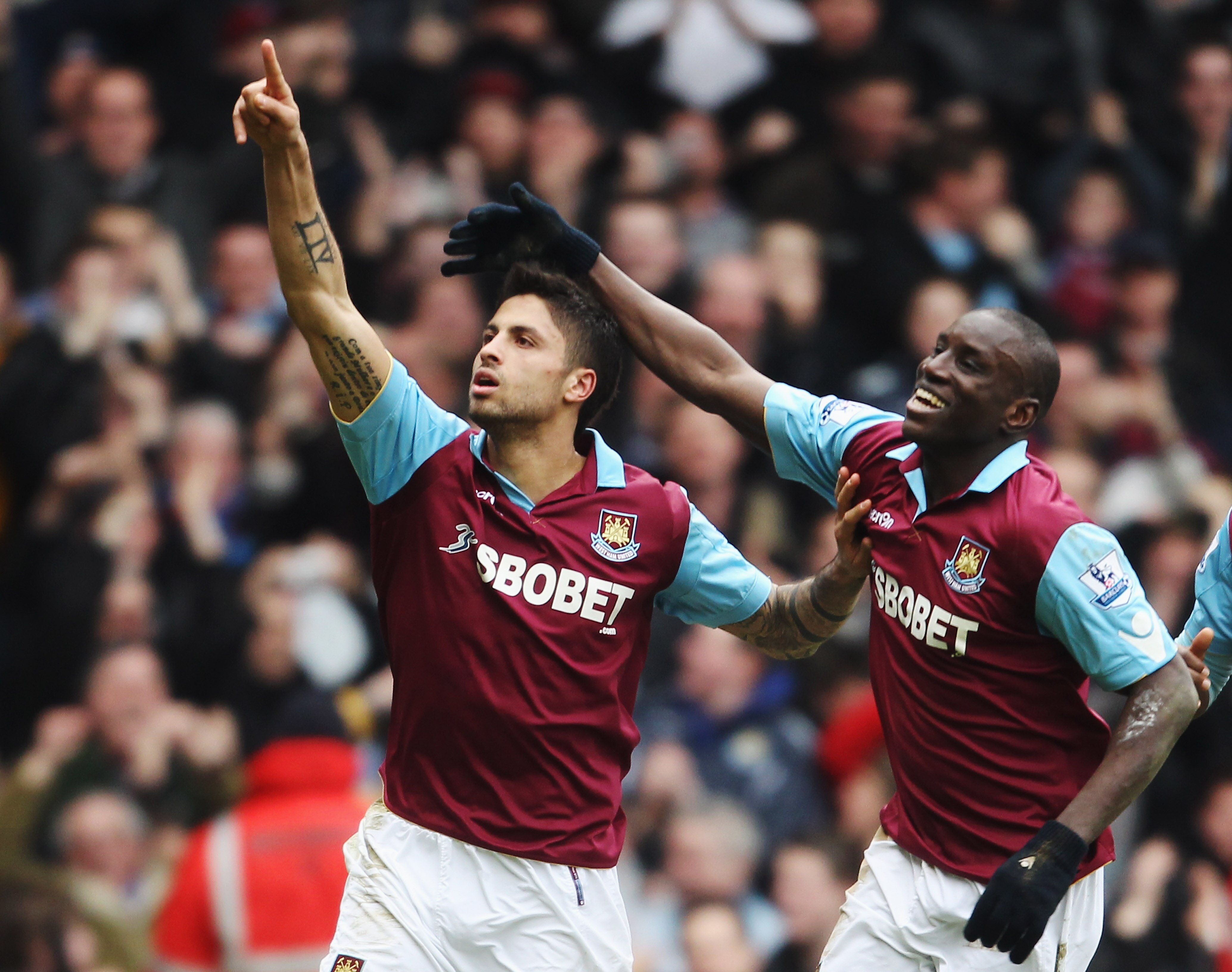 LONDON, UNITED KINGDOM - MARCH 05:  Manuel da Costa (L) of West Ham United celebrates with team mate Demba Ba (R) after scoring during the Barclays Premier League match between West Ham United and Stoke City at the Boleyn Ground on March 5, 2011 in London