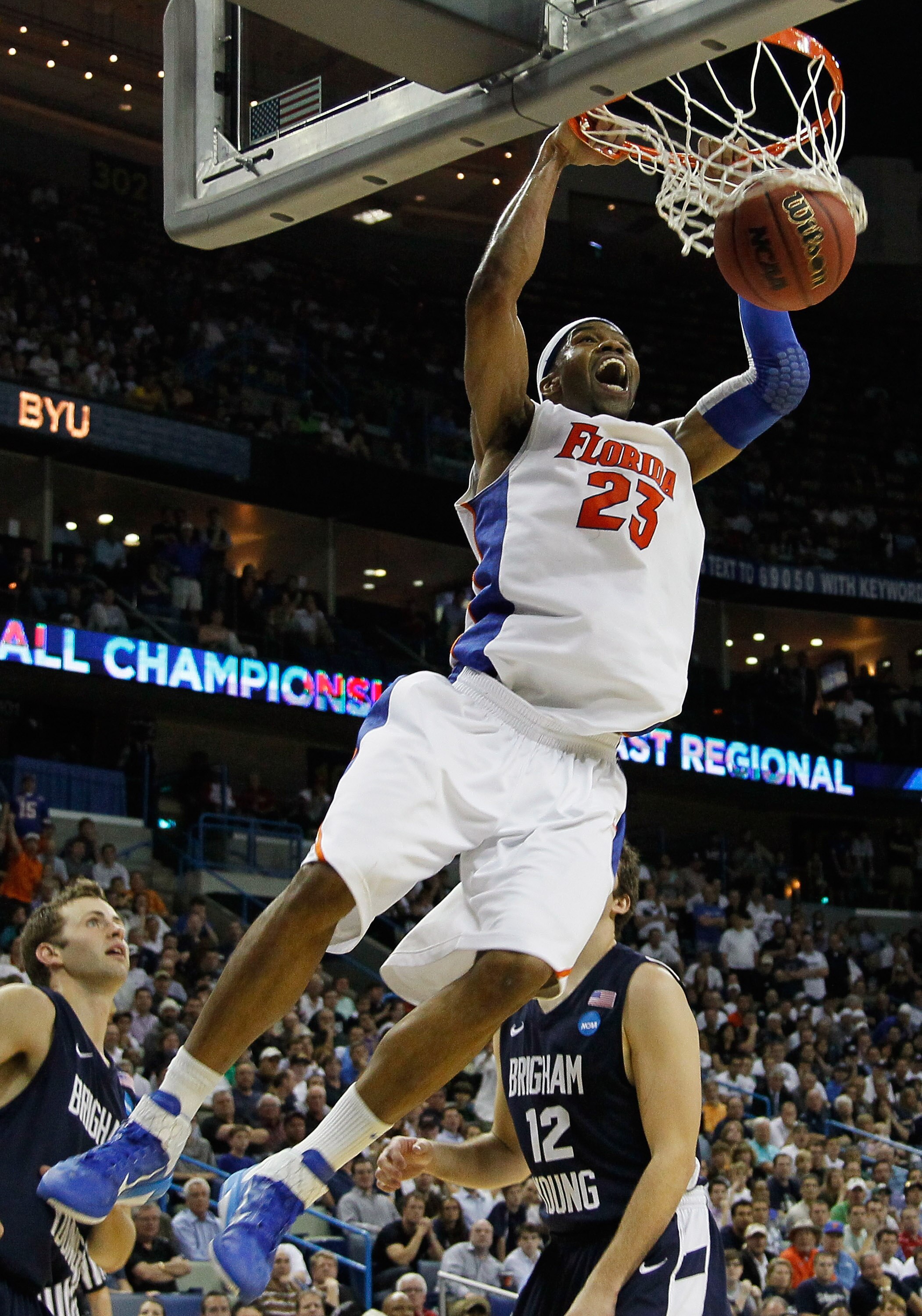 NEW ORLEANS, LA - MARCH 24:  Alex Tyus #23 of the Florida Gators dunks during their 83 to 74 win over the Brigham Young Cougars in the Southeast regional of the 2011 NCAA men's basketball tournament at New Orleans Arena on March 24, 2011 in New Orleans, L