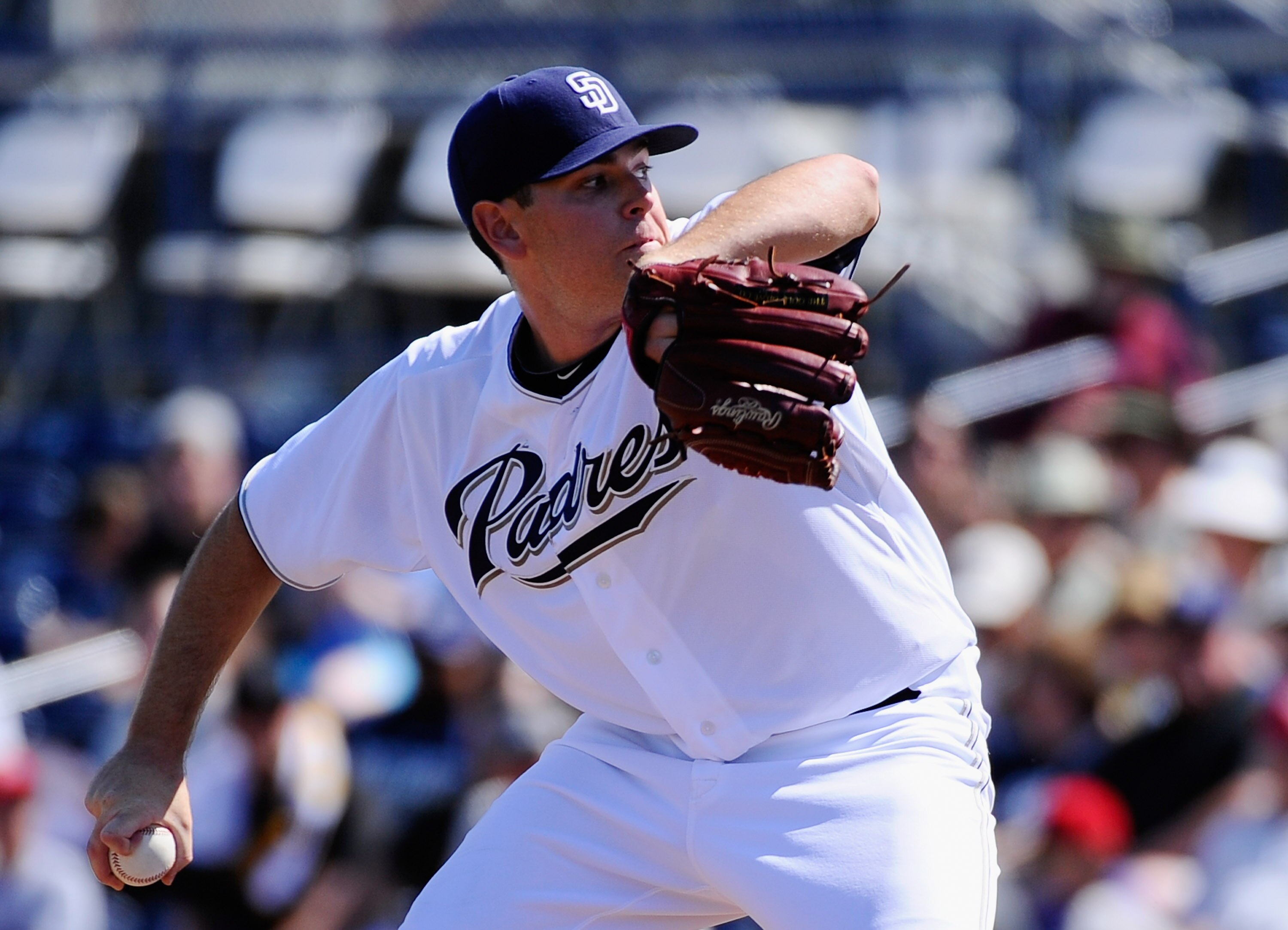 PEORIA, AZ - MARCH 13:  Pitcher Tim Stauffer #46 of the San Diego Padres  throws a pitch against the Cleveland Indians during the third inning of the spring training baseball game at Peoria Stadium on March 13, 2011 in Peoria, Arizona.  (Photo by Kevork D