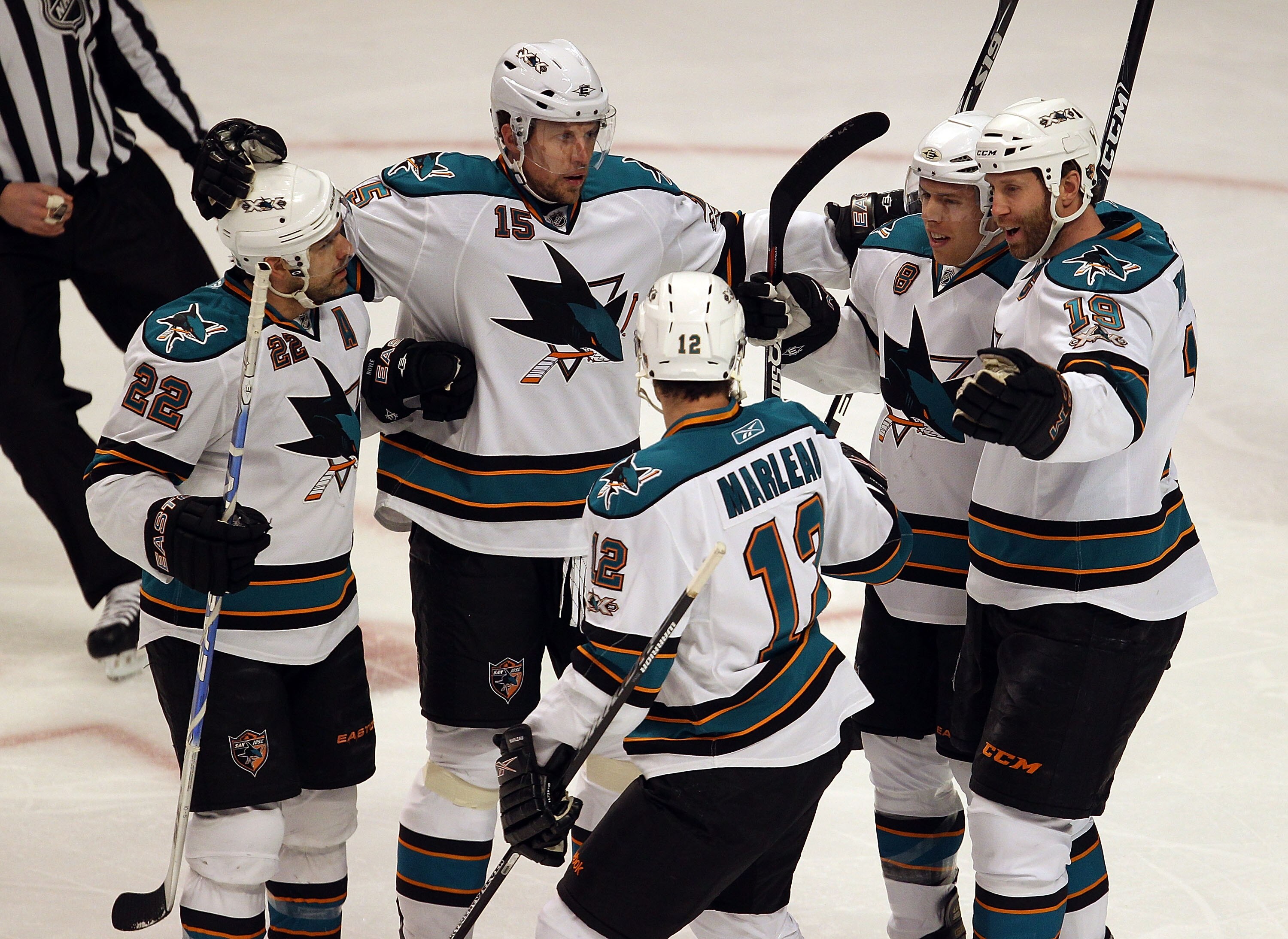 CHICAGO, IL - MARCH 14: (L-R) Dan Boyle #22, Dany Heatley #15, Patrick Marleau #12, Ian White #9 and Joe Thornton #19 of the San Jose Sharks celebrate a goal against the Chicago Blackhawks at the United Center on March 14, 2011 in Chicago, Illinois. The B