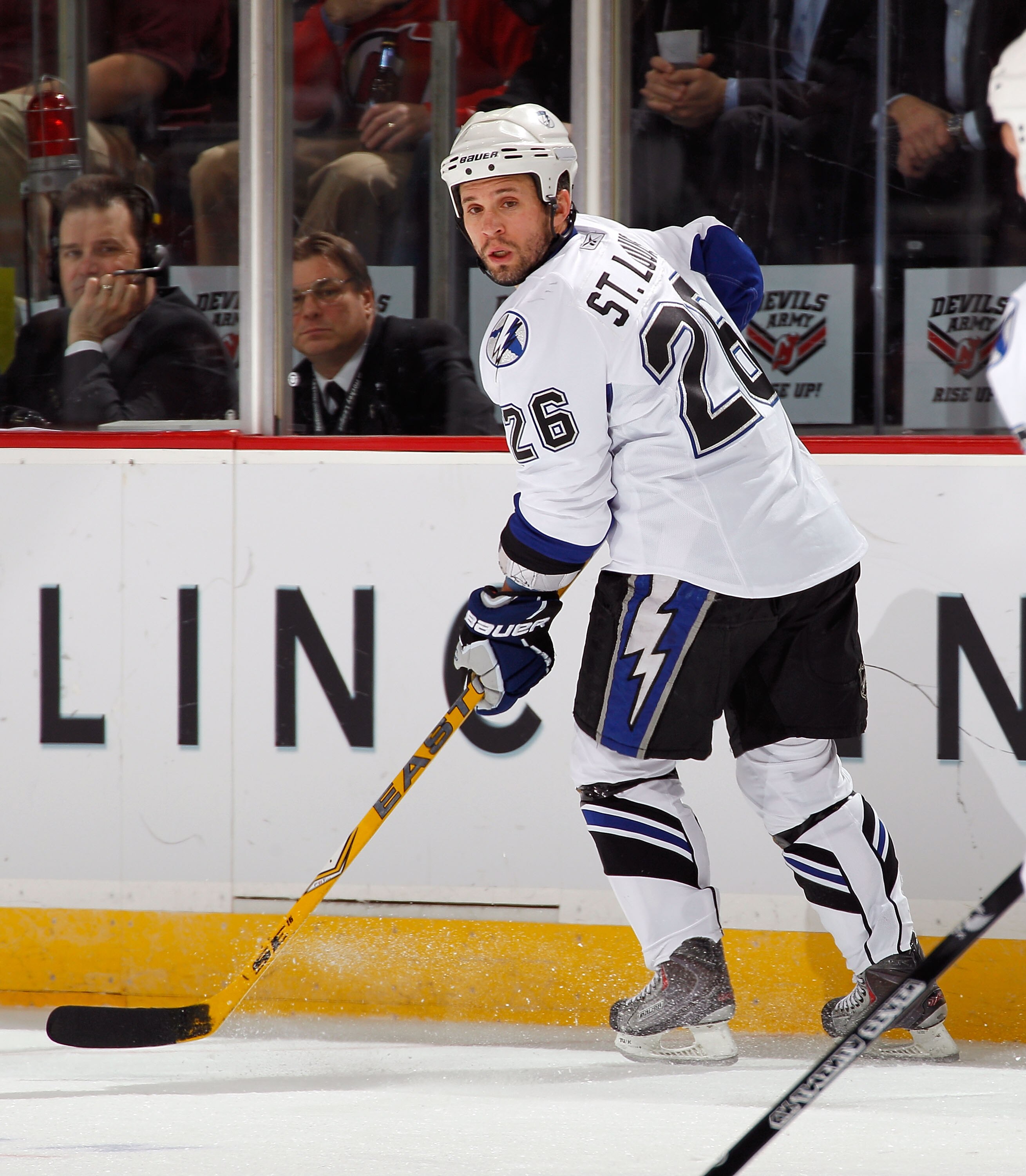 NEWARK, NJ - MARCH 02:  Martin St. Louis #26 of the Tampa Bay Lightning skates during an NHL hockey game against the New Jersey Devils at the Prudential Center on March 2, 2011 in Newark, New Jersey.  (Photo by Paul Bereswill/Getty Images)