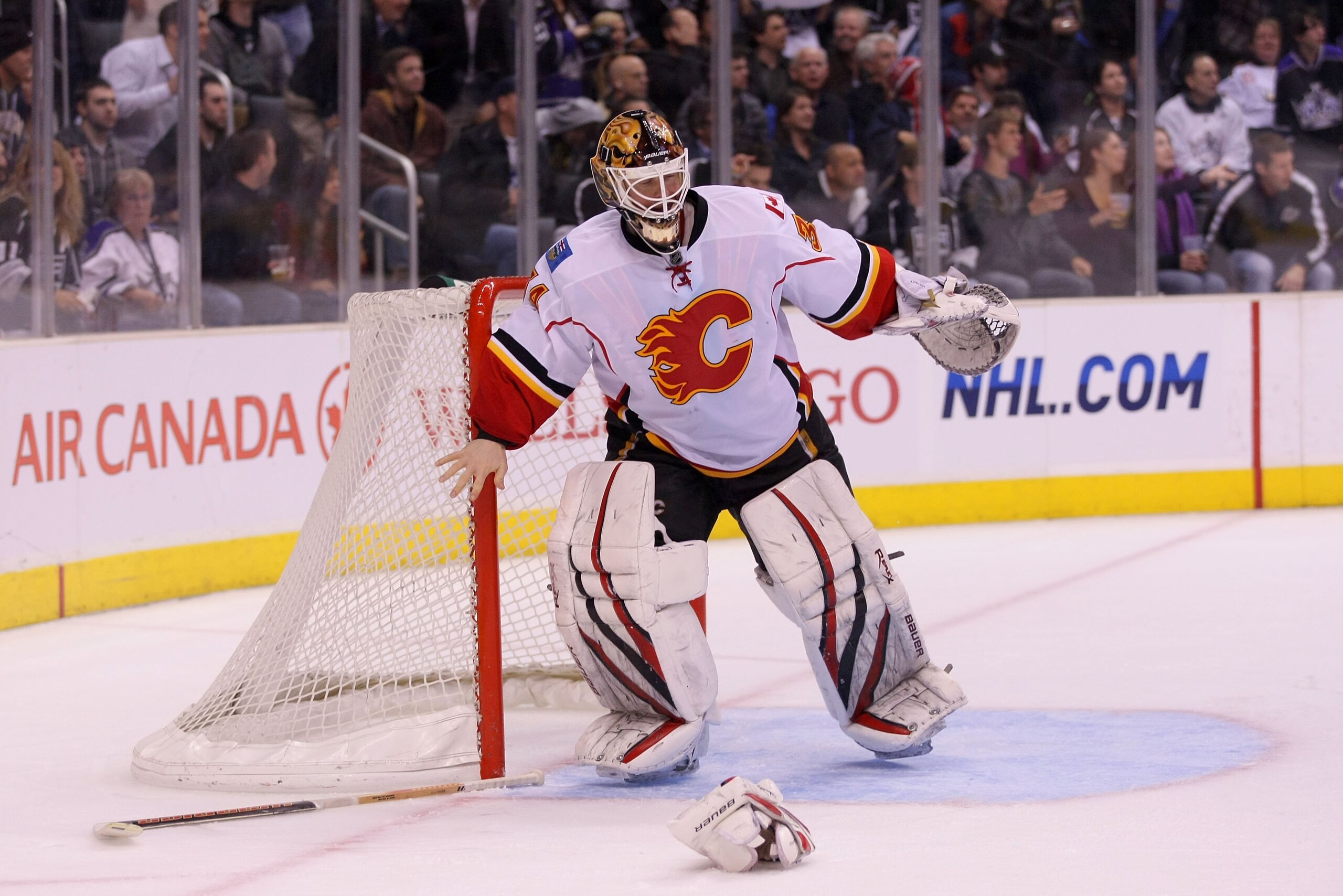 LOS ANGELES, CA - MARCH 21: Goaltender Miikka Kiprusoff #34 of the Calgary Flames loses his stick and blocker during their NHL game against the Los Angeles Kings at Staples Center on March 21, 2011 in Los Angeles, California. The Kings defeated the Flame LOS ANGELES, CA - MARCH 21: Goaltender Miikka Kiprusoff #34 of the Calgary Flames loses his stick and blocker during their NHL game against the Los Angeles Kings at Staples Center on March 21, 2011 in Los Angeles, California. The Kings defeated the Flame