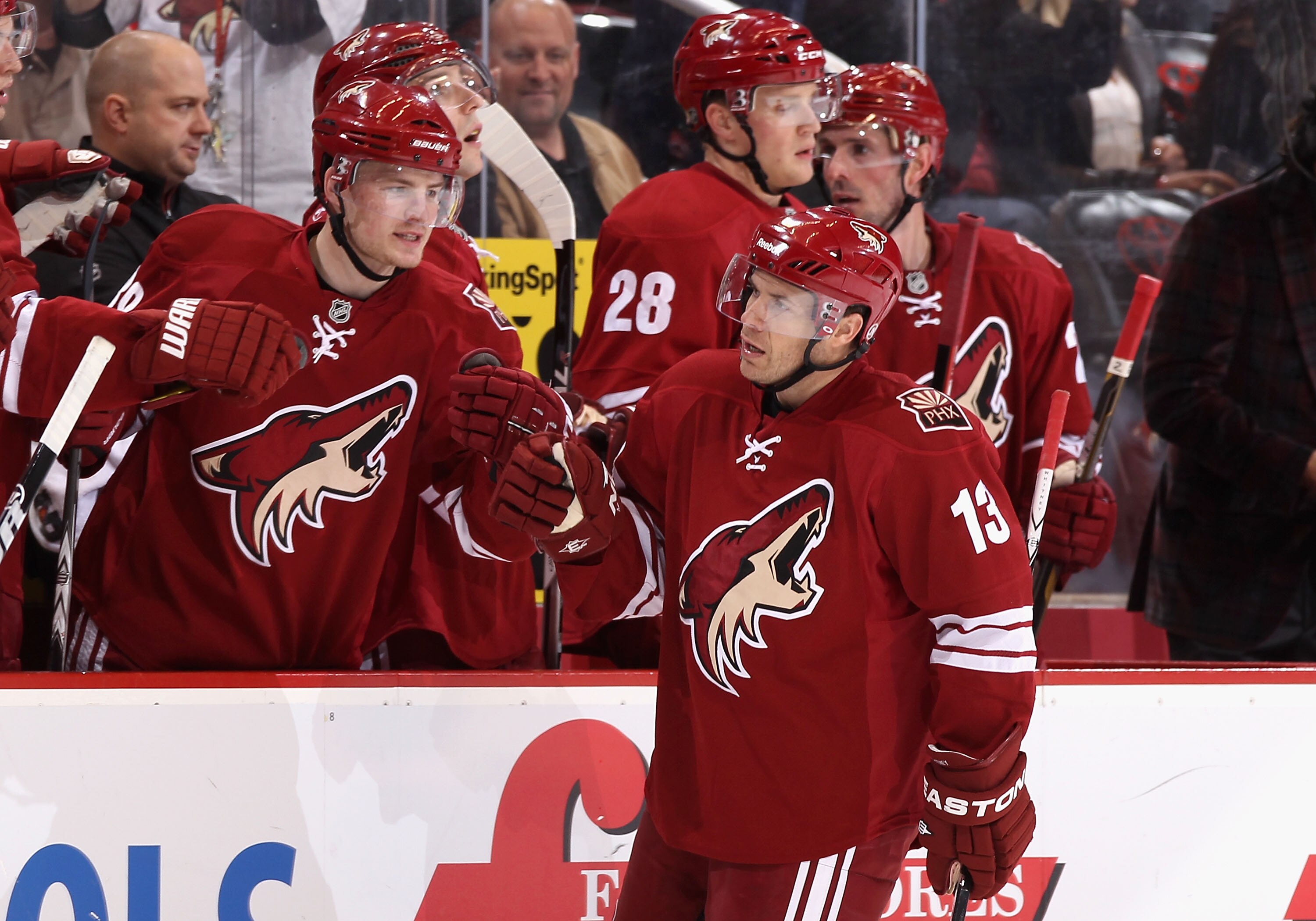 GLENDALE, AZ - MARCH 05:  Ray Whitney #13 of the Phoenix Coyotes celebrates with teammates after scoring during the NHL game against the Detroit Red Wings at Jobing.com Arena on March 5, 2011 in Glendale, Arizona. The Coyotes defeated the Red Wings 5-4 in