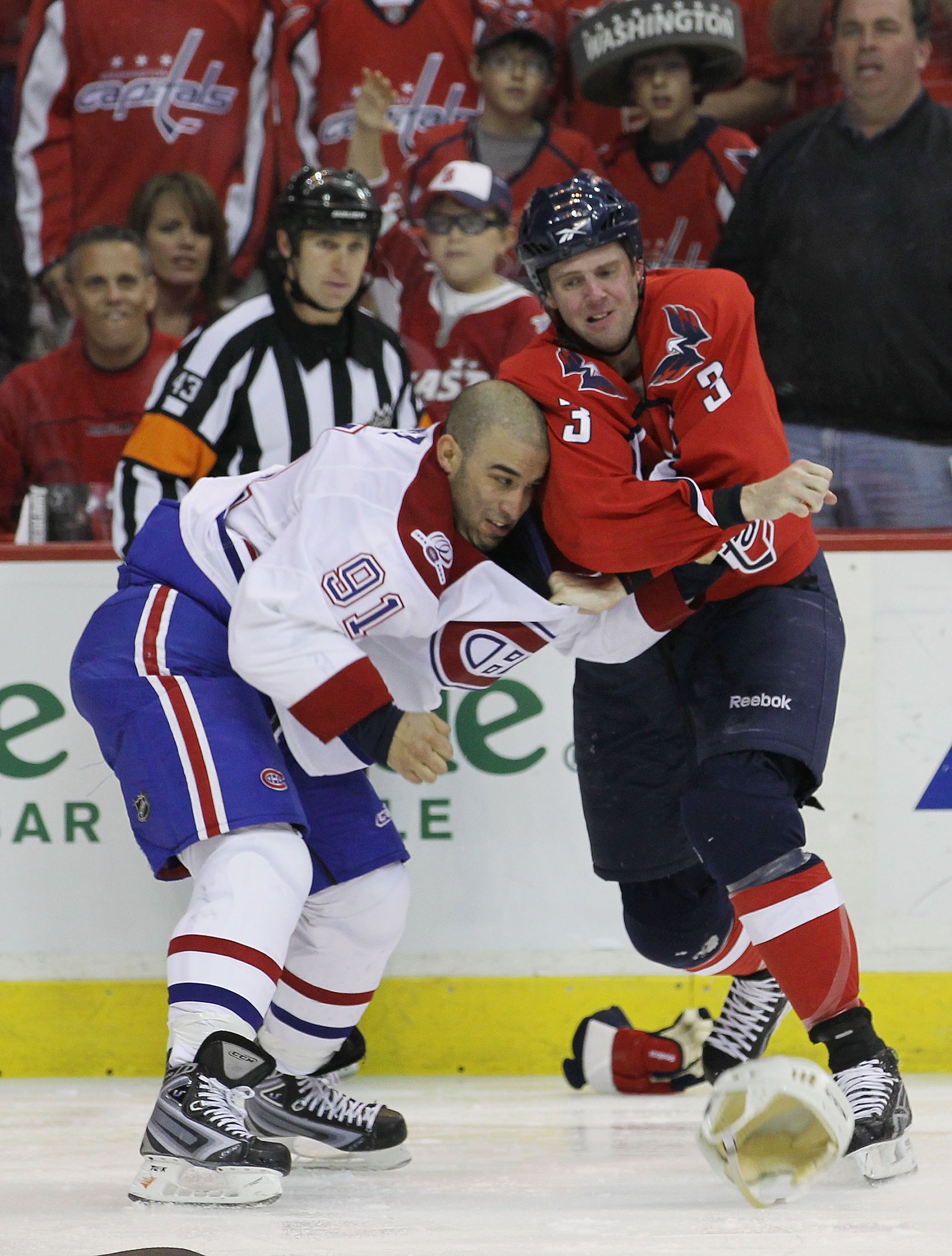 WASHINGTON - APRIL 17: Scott Gomez #91 of the Montreal Canadiens fights with Tom Poti #3 of the Washington Capitals in Game Two of the Eastern Conference Quarterfinals during the 2010 NHL Stanley Cup Playoffs at the Verizon Center on April 17, 2010 in Was
