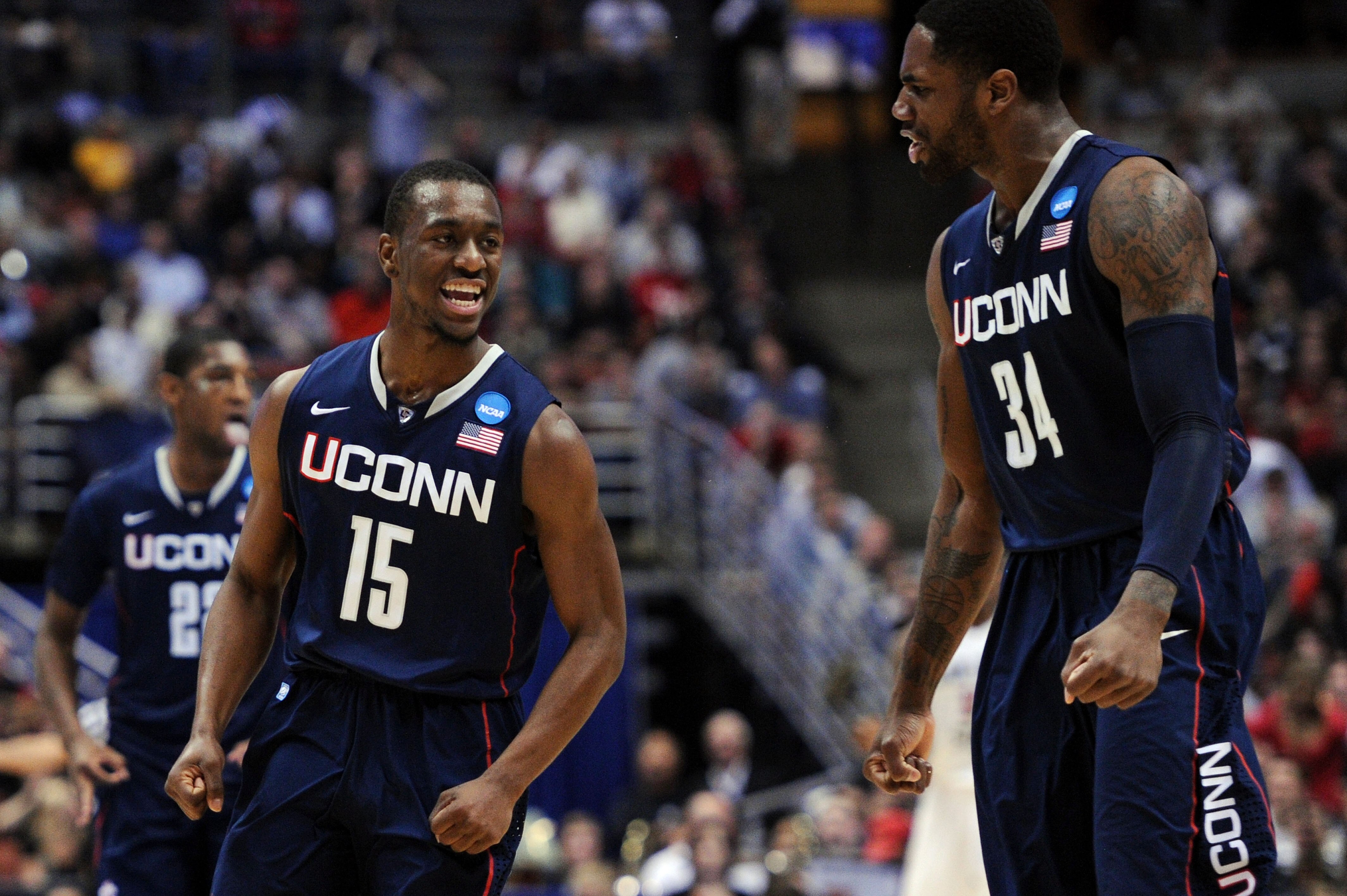 ANAHEIM, CA - MARCH 24:  Kemba Walker #15 and Alex Oriakhi #34 of the Connecticut Huskies celebrate after a play against the San Diego State Aztecs during the west regional semifinal of the 2011 NCAA men's basketball tournament at the Honda Center on Marc
