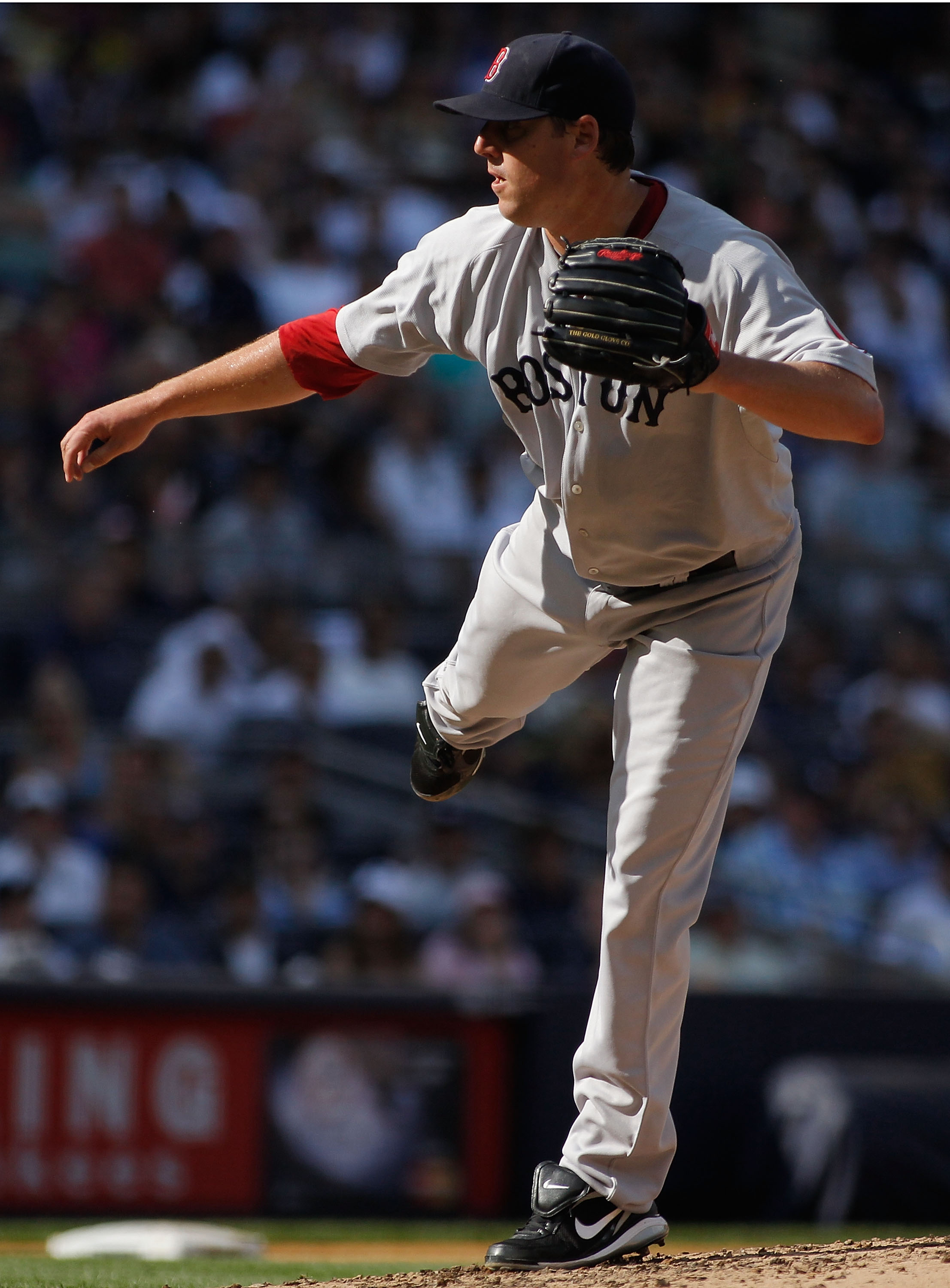 NEW YORK - AUGUST 07:  John Lackey #40 of the Boston Red Sox delivers a pitch in the second-inning against the New York Yankees on August 7, 2010 at Yankee Stadium in the Bronx borough of New York City.  (Photo by Mike Stobe/Getty Images)