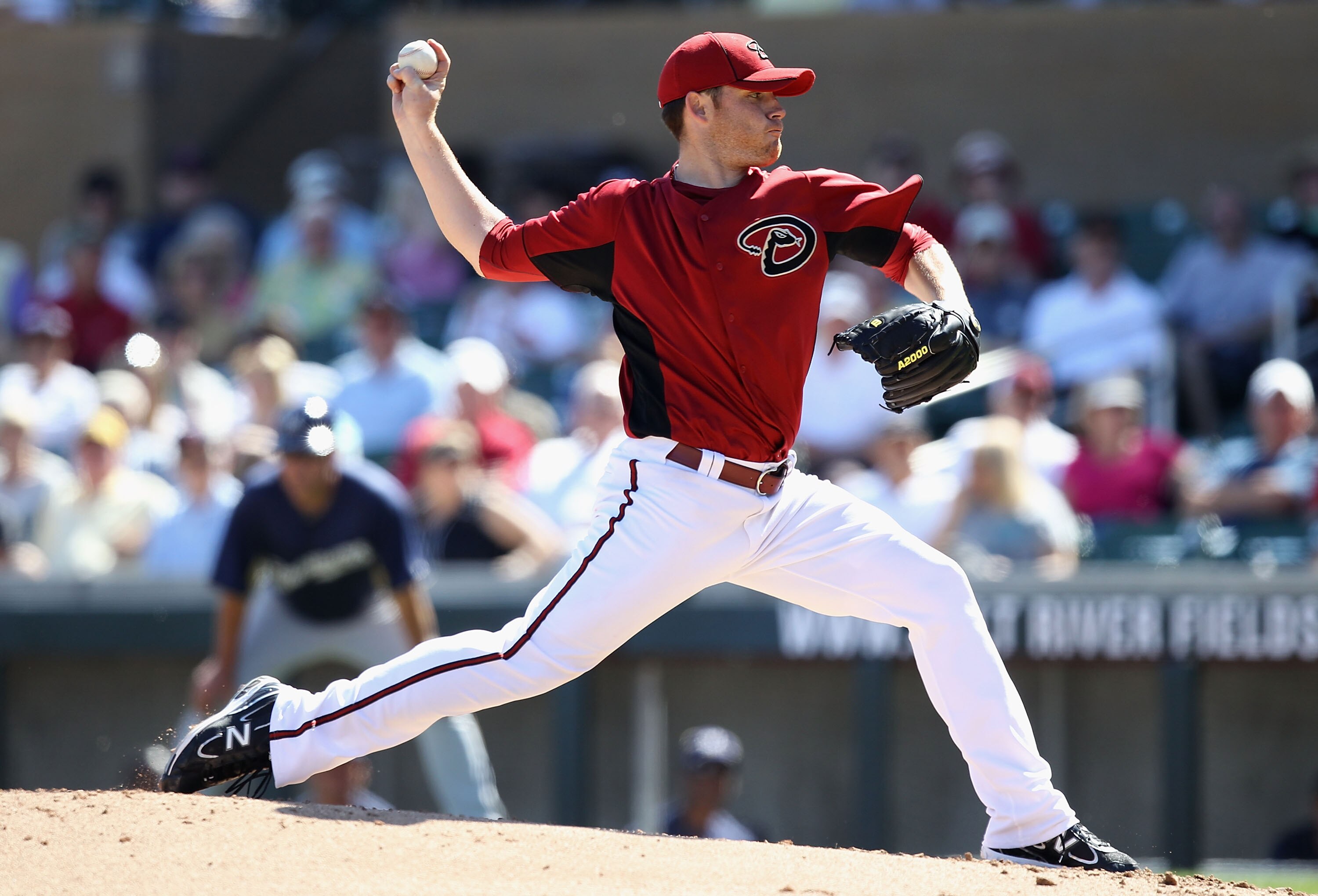 SCOTTSDALE, AZ - MARCH 09:  Starting pitcher Ian Kennedy #31 of the Arizona Diamondbacks pitches against the Milwaukee Brewers during the spring training game at Salt River Fields at Talking Stick on March 9, 2011 in Scottsdale, Arizona.  (Photo by Christ