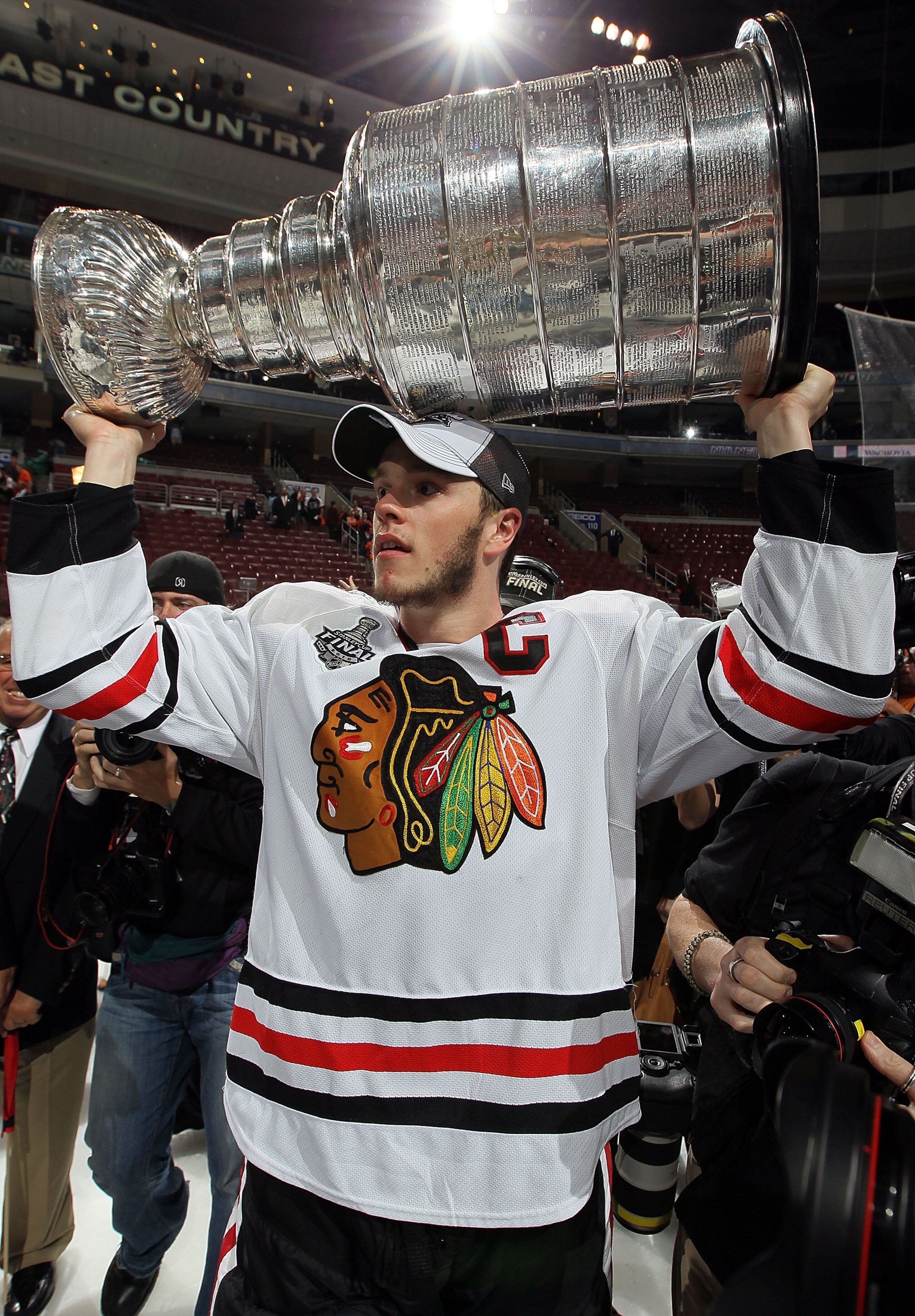 PHILADELPHIA - JUNE 09: Jonathan Toews #19 of the Chicago Blackhawks hoists the Stanley Cup after teammate Patrick Kane #88 scored the game-winning goal in overtime to defeat the Philadelphia Flyers 4-3 and win the Stanley Cup in Game Six of the 2010 NHL