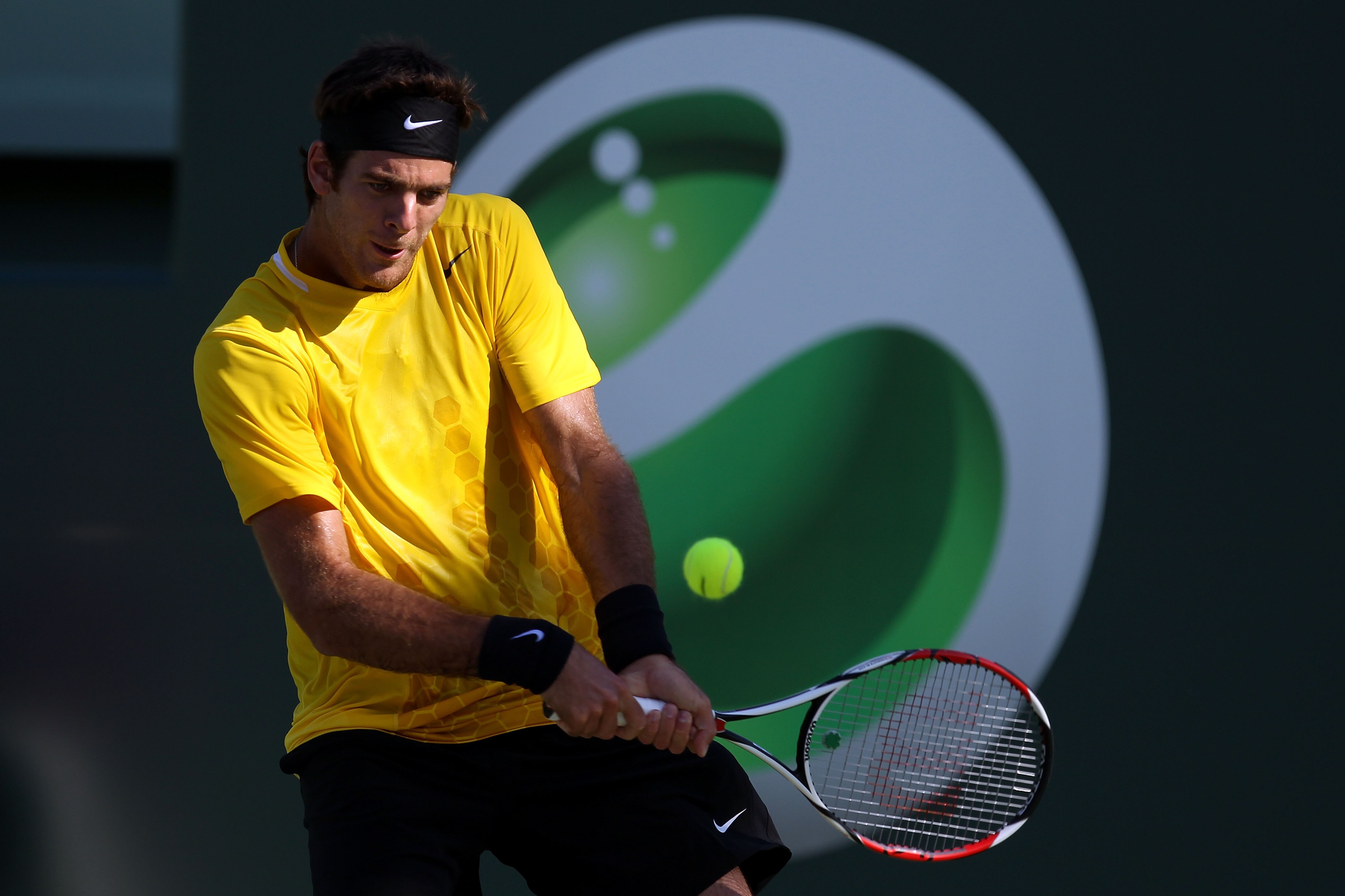 KEY BISCAYNE, FL - MARCH 23:  Juan Martin Del Potro of Argentina returns against Ricardo Mello of Brazil during the Sony Ericsson Open at Crandon Park Tennis Center on March 23, 2011 in Key Biscayne, Florida.  (Photo by Al Bello/Getty Images)