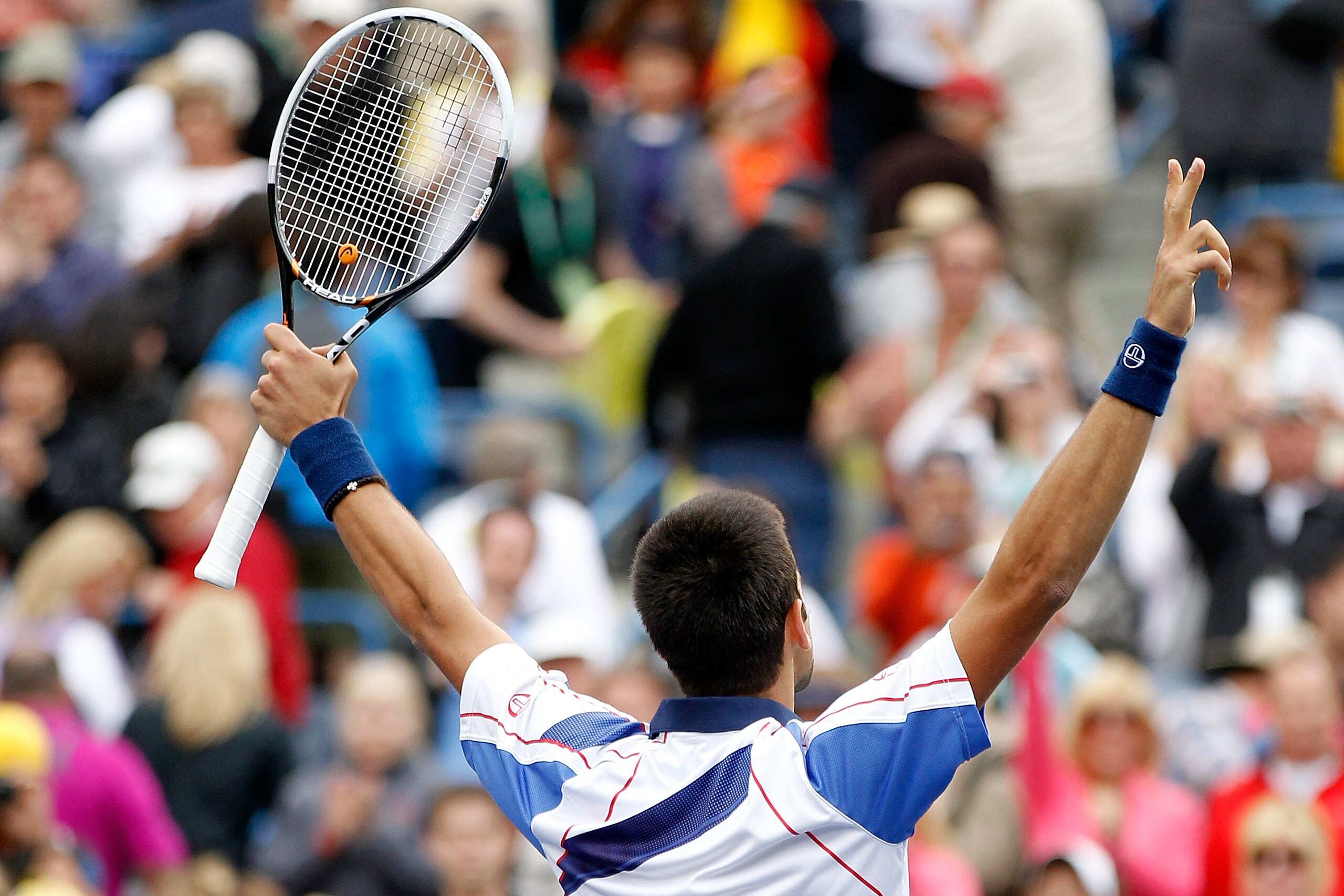 INDIAN WELLS, CA - MARCH 20:  Novak Djokovic of Serbia celebrates his win over Rafael Nadal of Spain during the final of the BNP Paribas Open at the Indian Wells Tennis Garden on March 20, 2011 in Indian Wells, California.  (Photo by Matthew Stockman/Gett