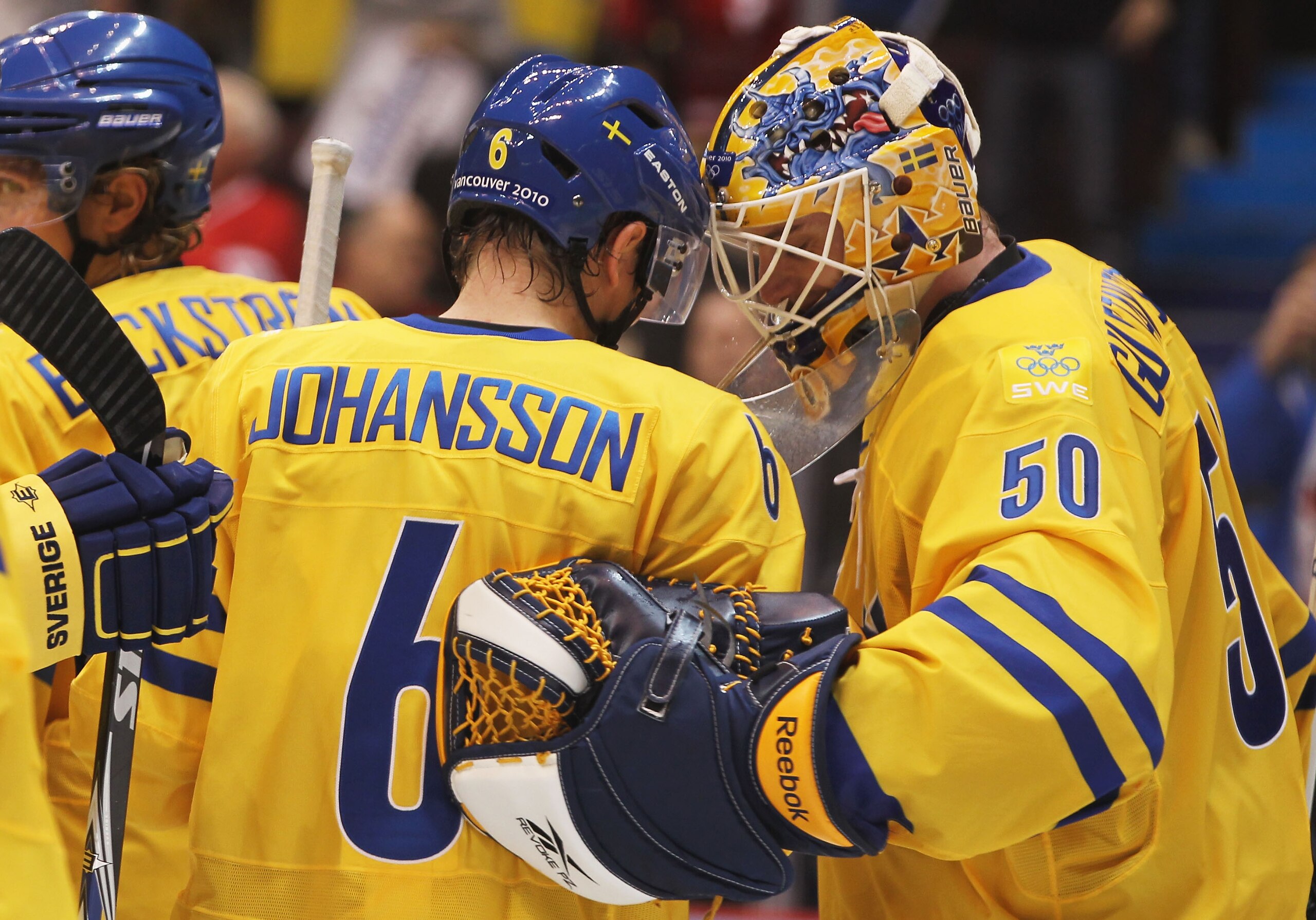 VANCOUVER, BC - FEBRUARY 19:  Magnus Johansson #6 and goalkeeper Jonas Gustavsson #50 of Sweden celebrate after defeating Belarus 4-2 during the ice hockey men's preliminary game on day 8 of the Vancouver 2010 Winter Olympics at Canada Hockey Place on Feb