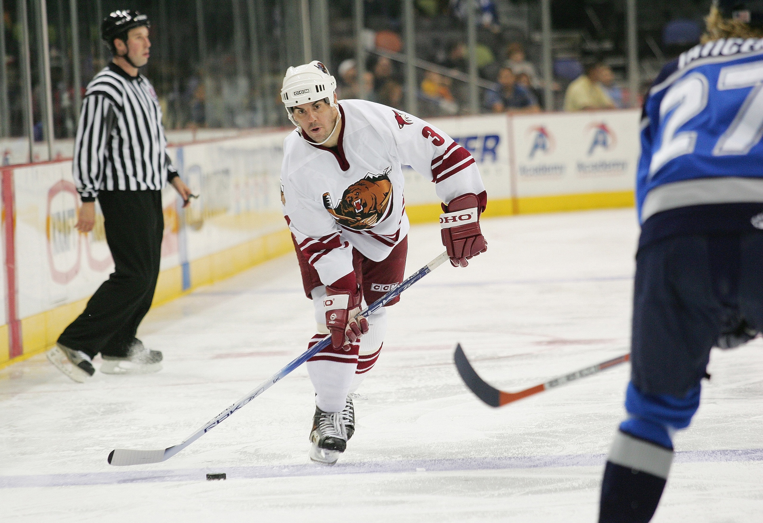 SAN ANTONIO - DECEMBER 9:  Terry Virtue #3 of the Utah Grizzlies looks to play the puck at the blueline against Petr Taticek #27 of the San Antonio Rampage at SBC Center on December 9, 2004 in San Antonio, Texas.  The Rampage won 5-0.  (Photo by Darren Ab