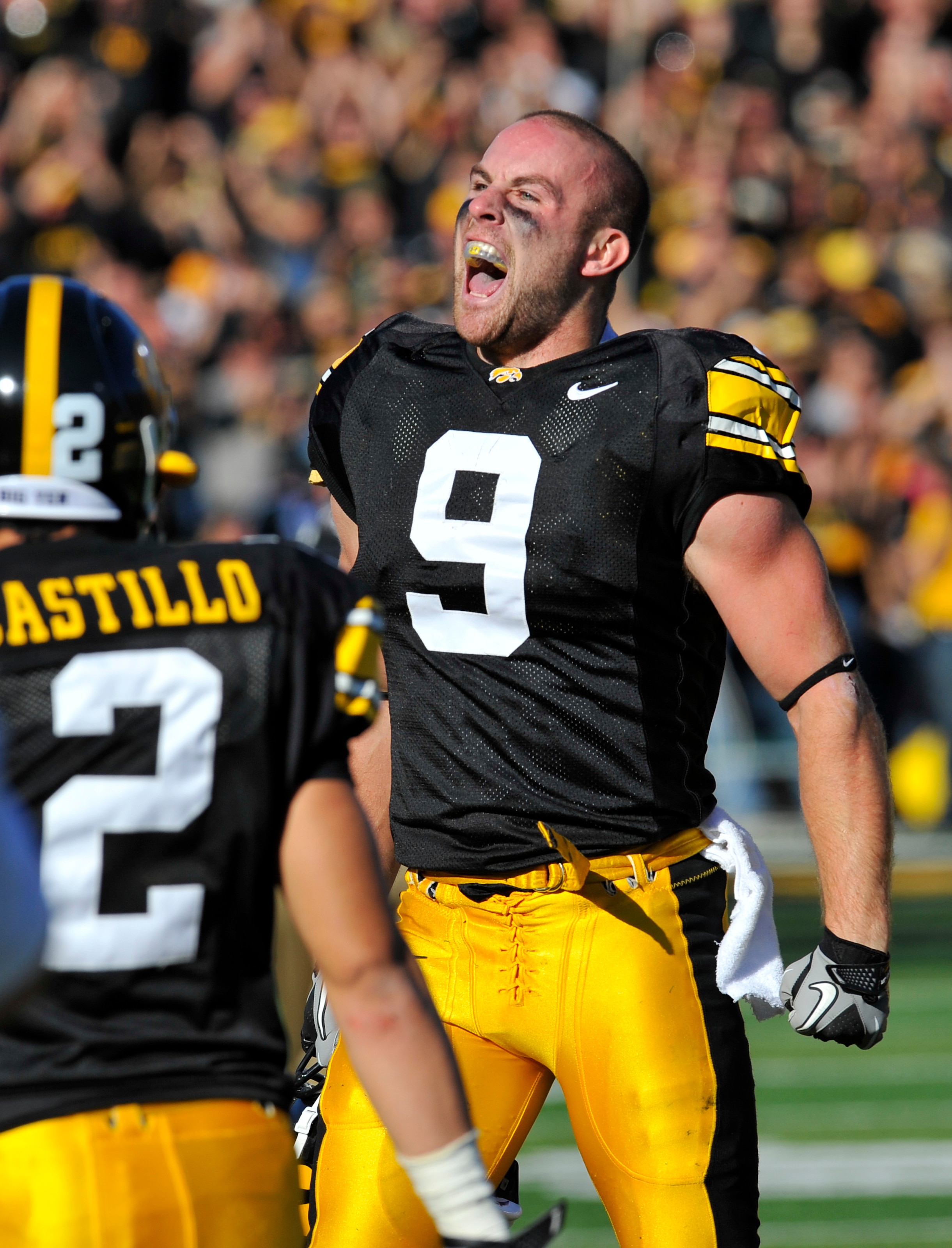 IOWA CITY, IA - OCTOBER 30- Cornerback Tyler Sash of the University of Iowa Hawkeyes celebrates after intercepting a pass during the first half of an NCAA college football game against the Michigan State Spartans at Kinnick Stadium on October 30, 2010 in