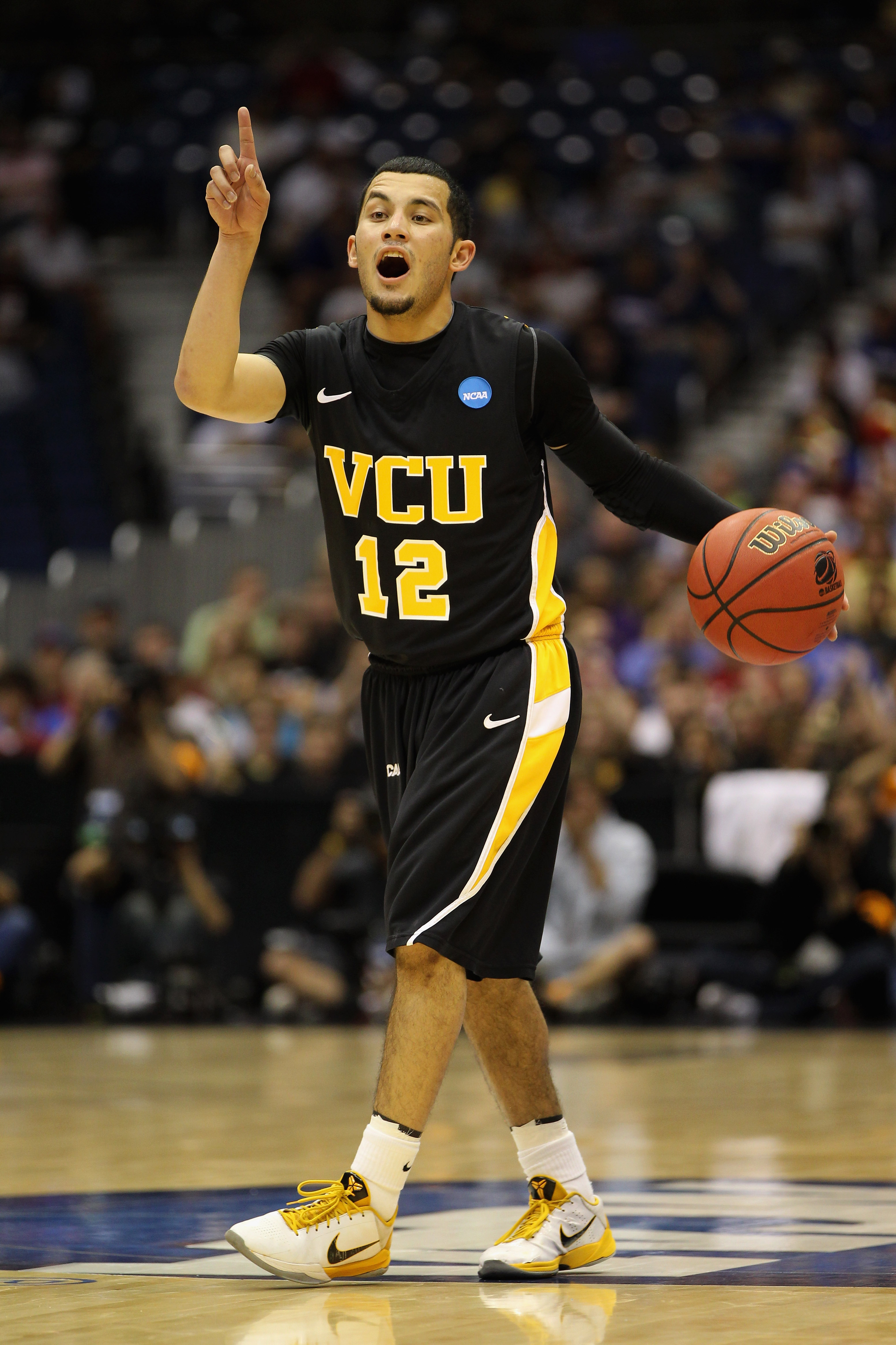 SAN ANTONIO, TX - MARCH 25:  Joey Rodriguez #12 of the Virginia Commonwealth Rams sets up the play against the Florida State Seminoles during the southwest regional of the 2011 NCAA men's basketball tournament at the Alamodome on March 25, 2011 in San Ant