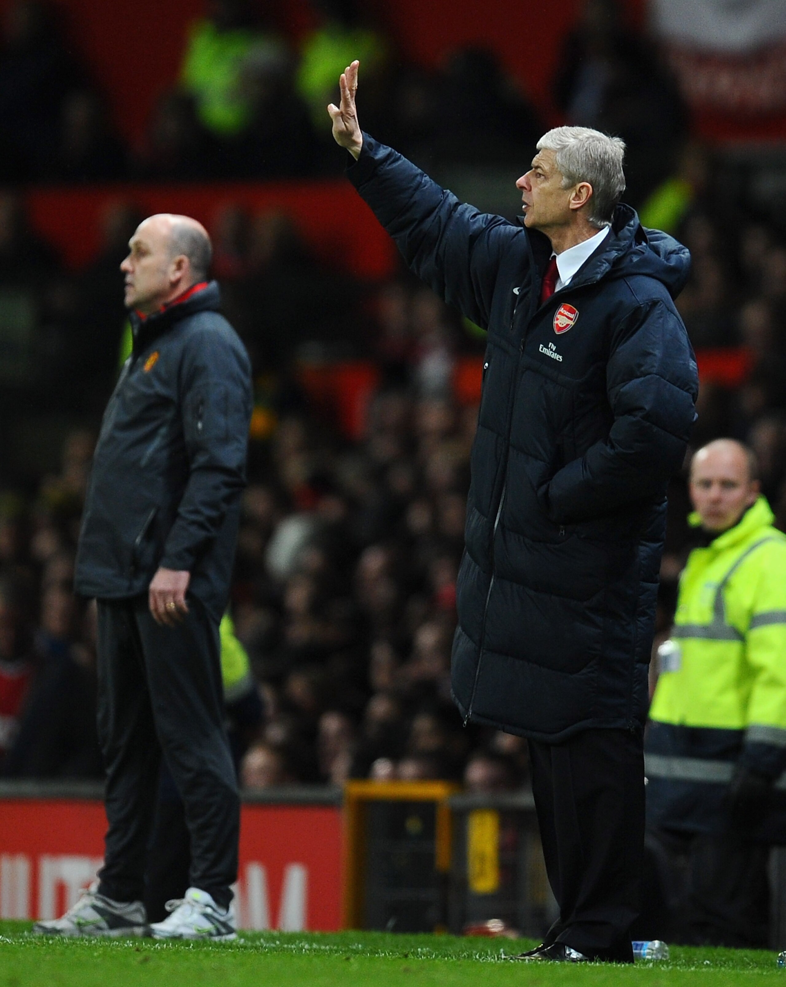 MANCHESTER, ENGLAND - MARCH 12: Arsenal manager Arsene Wenger directs his team during the FA Cup sponsored by E.On Sixth Round match between Manchester United and Arsenal at Old Trafford on March 12, 2011 in Manchester, England. (Photo by Clive Mason/Ge MANCHESTER, ENGLAND - MARCH 12: Arsenal manager Arsene Wenger directs his team during the FA Cup sponsored by E.On Sixth Round match between Manchester United and Arsenal at Old Trafford on March 12, 2011 in Manchester, England. (Photo by Clive Mason/Ge
