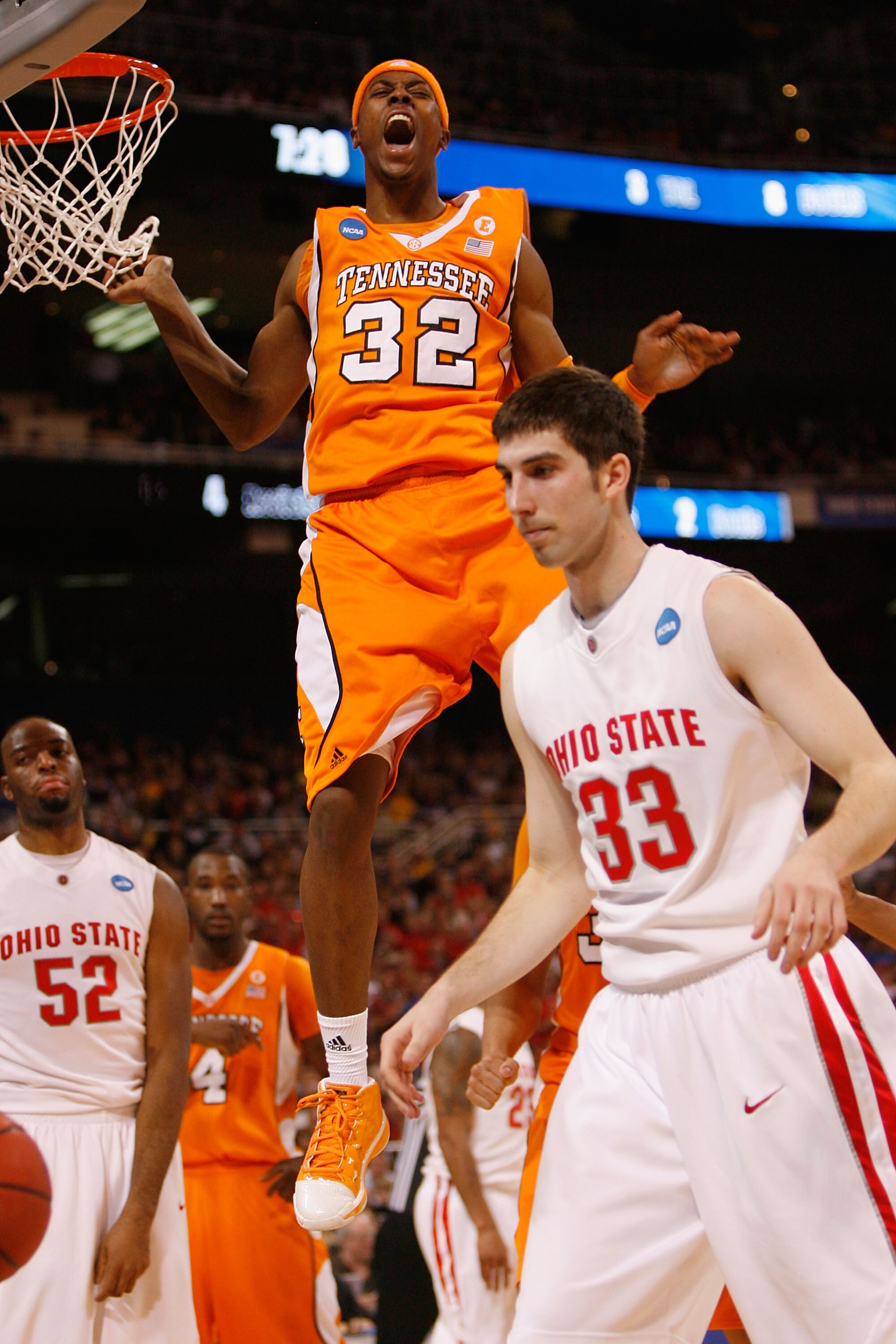 ST. LOUIS - MARCH 26: Scotty Hopson #32 of the Tennessee Volunteers celebrates a basket against the Ohio State Buckeyes during the midwest regional semifinal of the 2010 NCAA men's basketball tournament at the Edward Jones Dome on March 26, 2010 in St. Lo