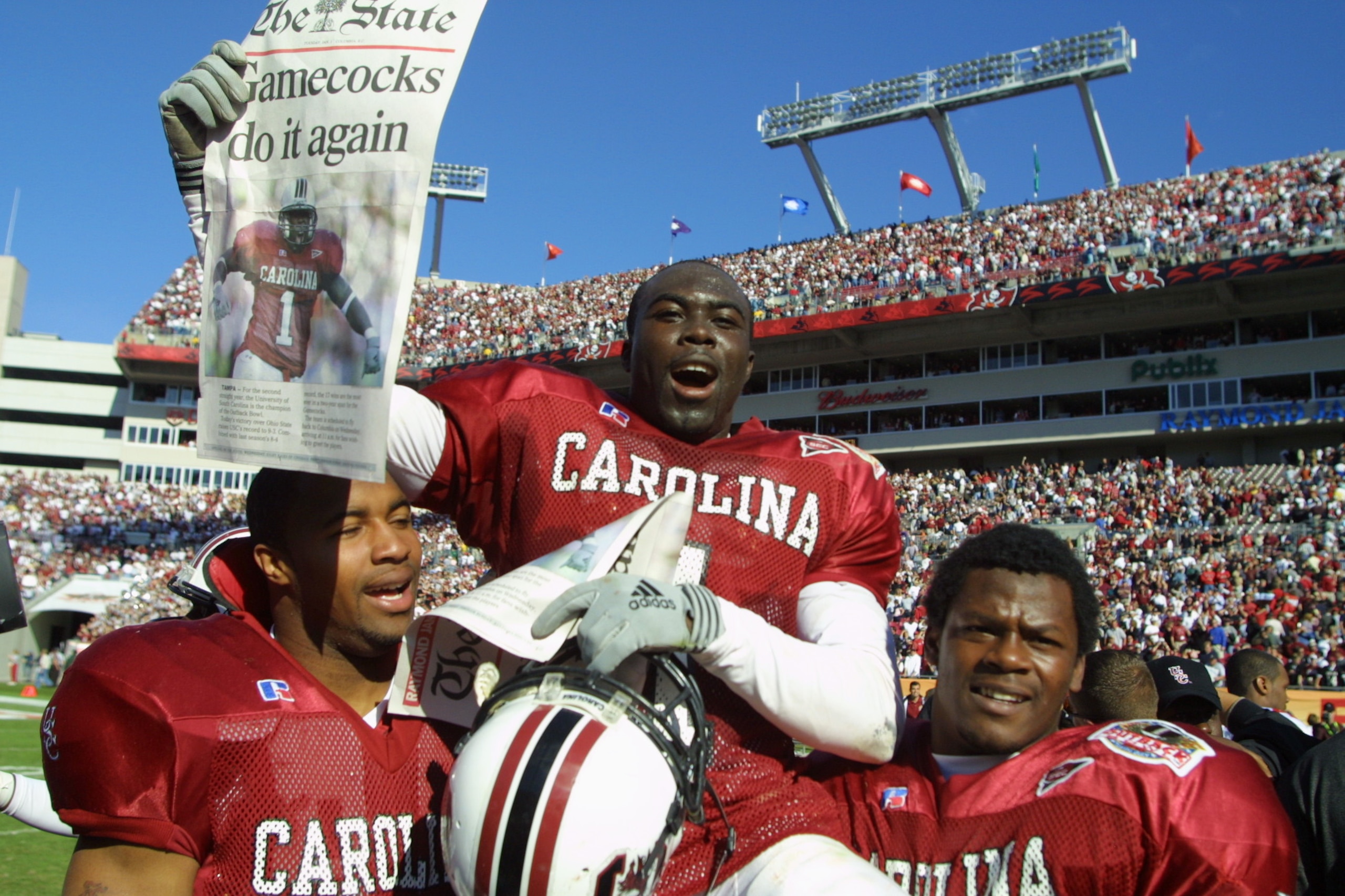 1 Jan 2002:  South Carolina player Antoine Nesmith, #1, is carried off the field by teammates after beating Ohio State 31-28 in the Outback Bowl at Raymond James Stadium in Tampa, Florida.  DIGITAL IMAGE. Mandatory Credit: Scott Halleran/Getty Images