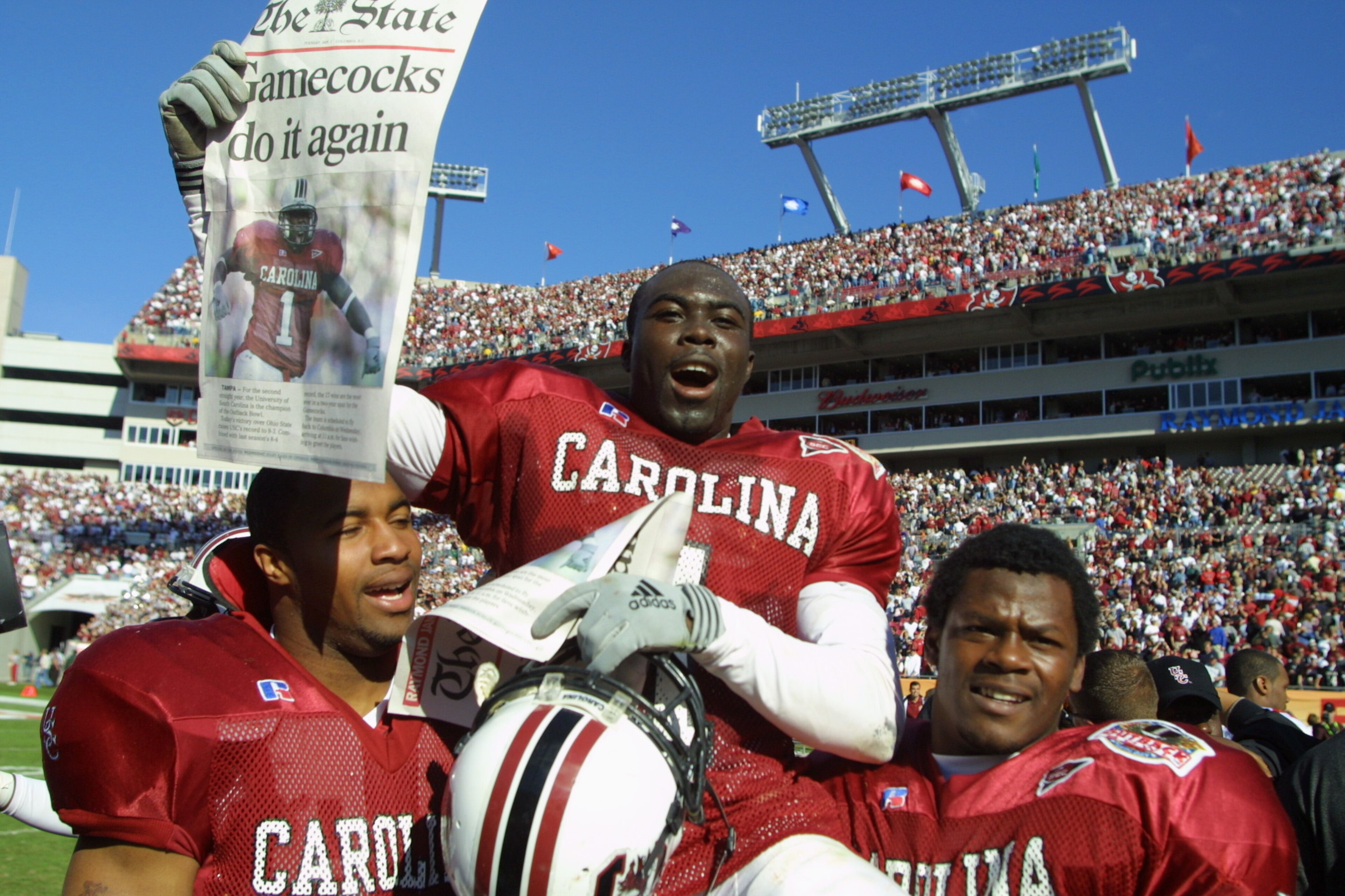 1 Jan 2002:  South Carolina player Antoine Nesmith, #1, is carried off the field by teammates after beating Ohio State 31-28 in the Outback Bowl at Raymond James Stadium in Tampa, Florida.  DIGITAL IMAGE. Mandatory Credit: Scott Halleran/Getty Images