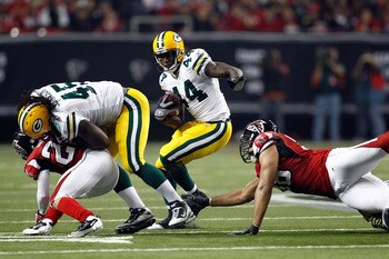 ATLANTA, GA - JANUARY 15:  James Starks #44 of the Green Bay Packers runs the ball against the Atlanta Falcons during their 2011 NFC divisional playoff game at Georgia Dome on January 15, 2011 in Atlanta, Georgia. The Packers won 48-21. (Photo by Chris Gr