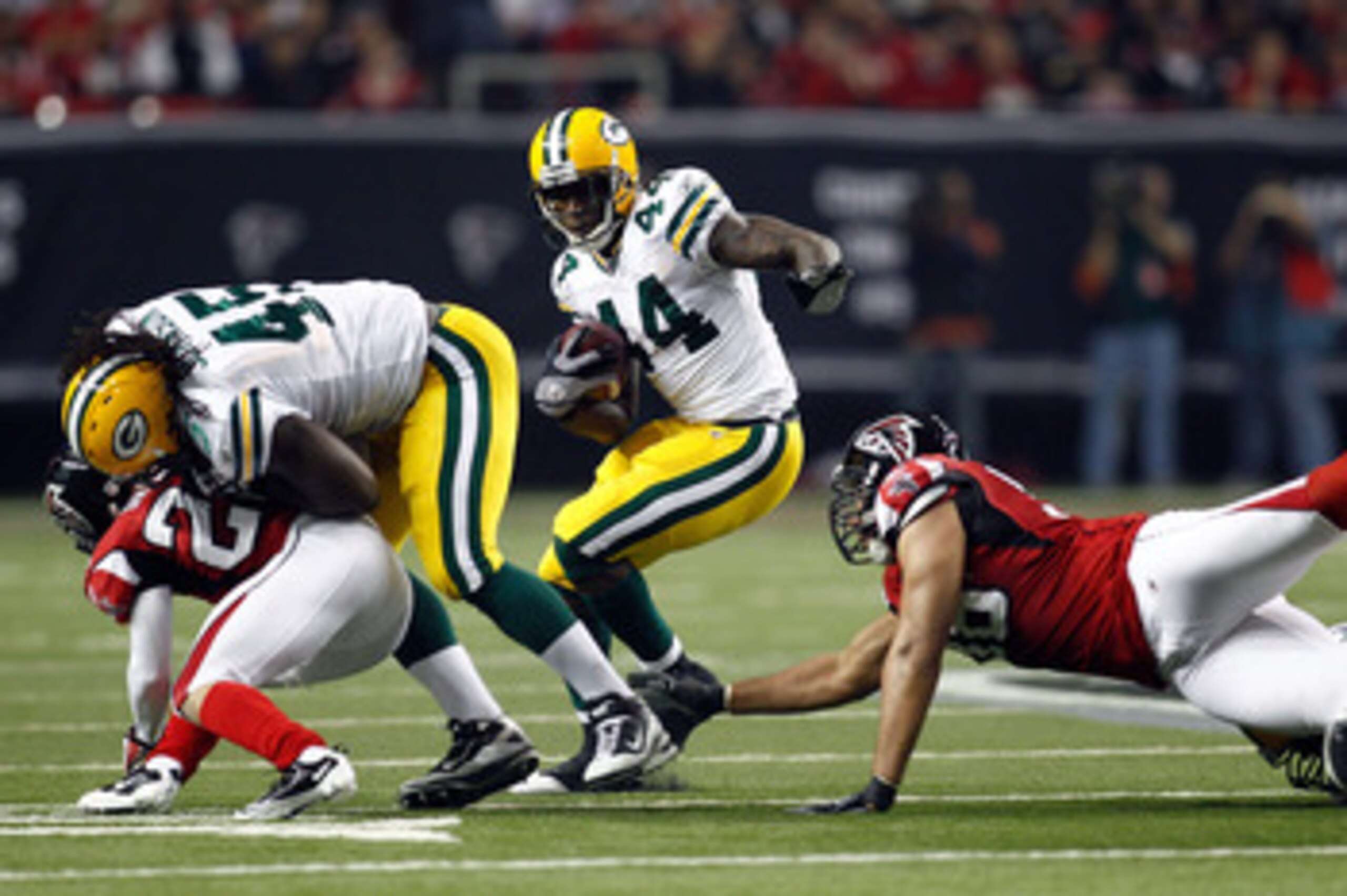 ATLANTA, GA - JANUARY 15:  James Starks #44 of the Green Bay Packers runs the ball against the Atlanta Falcons during their 2011 NFC divisional playoff game at Georgia Dome on January 15, 2011 in Atlanta, Georgia. The Packers won 48-21. (Photo by Chris Gr