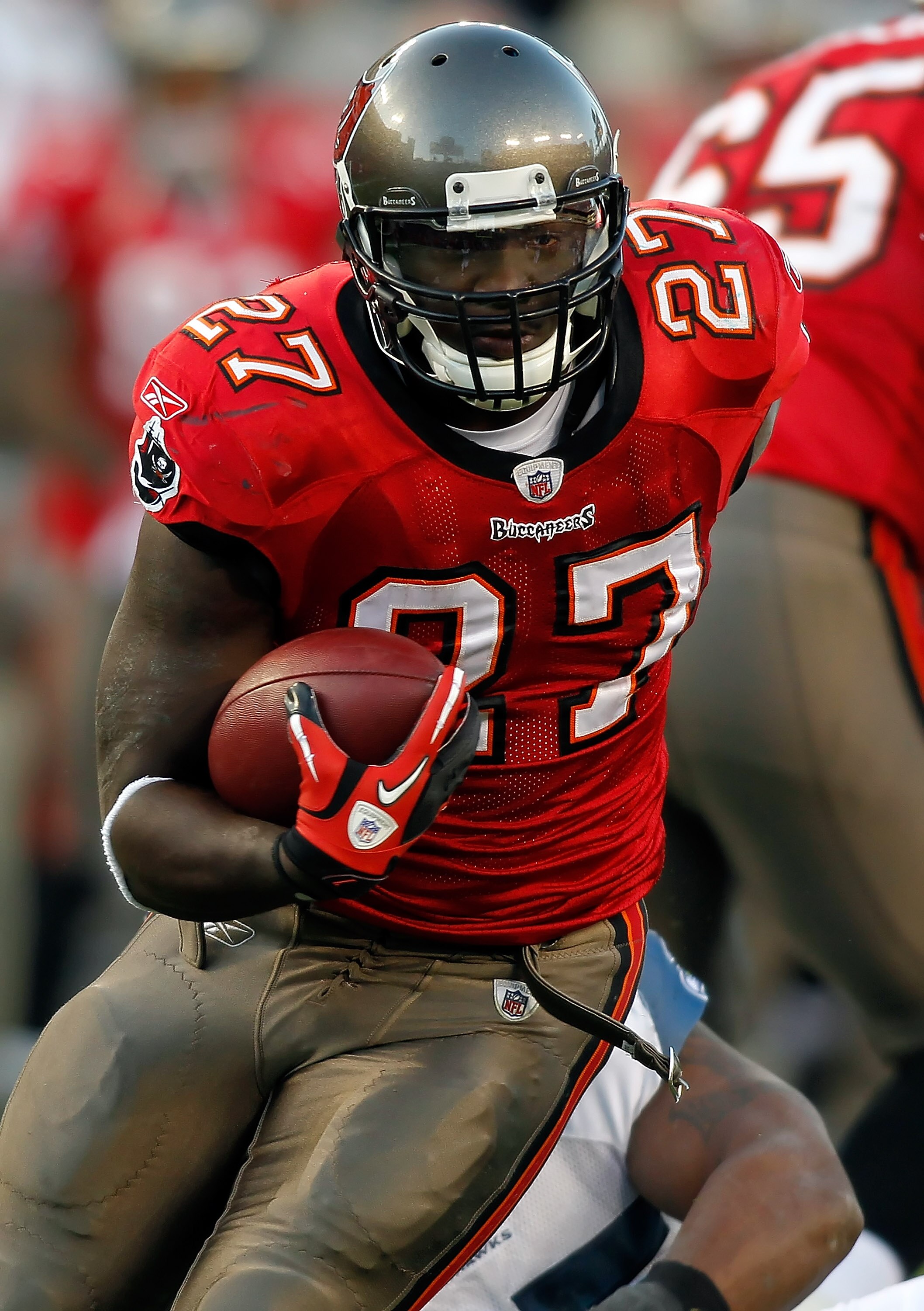 TAMPA, FL - DECEMBER 26: Running back LeGarrette Blount #27 of the Tampa Bay Buccaneers runs the ball against the Seattle Seahawks during the game at Raymond James Stadium on December 26, 2010 in Tampa, Florida. (Photo by J. Meric/Getty Images)