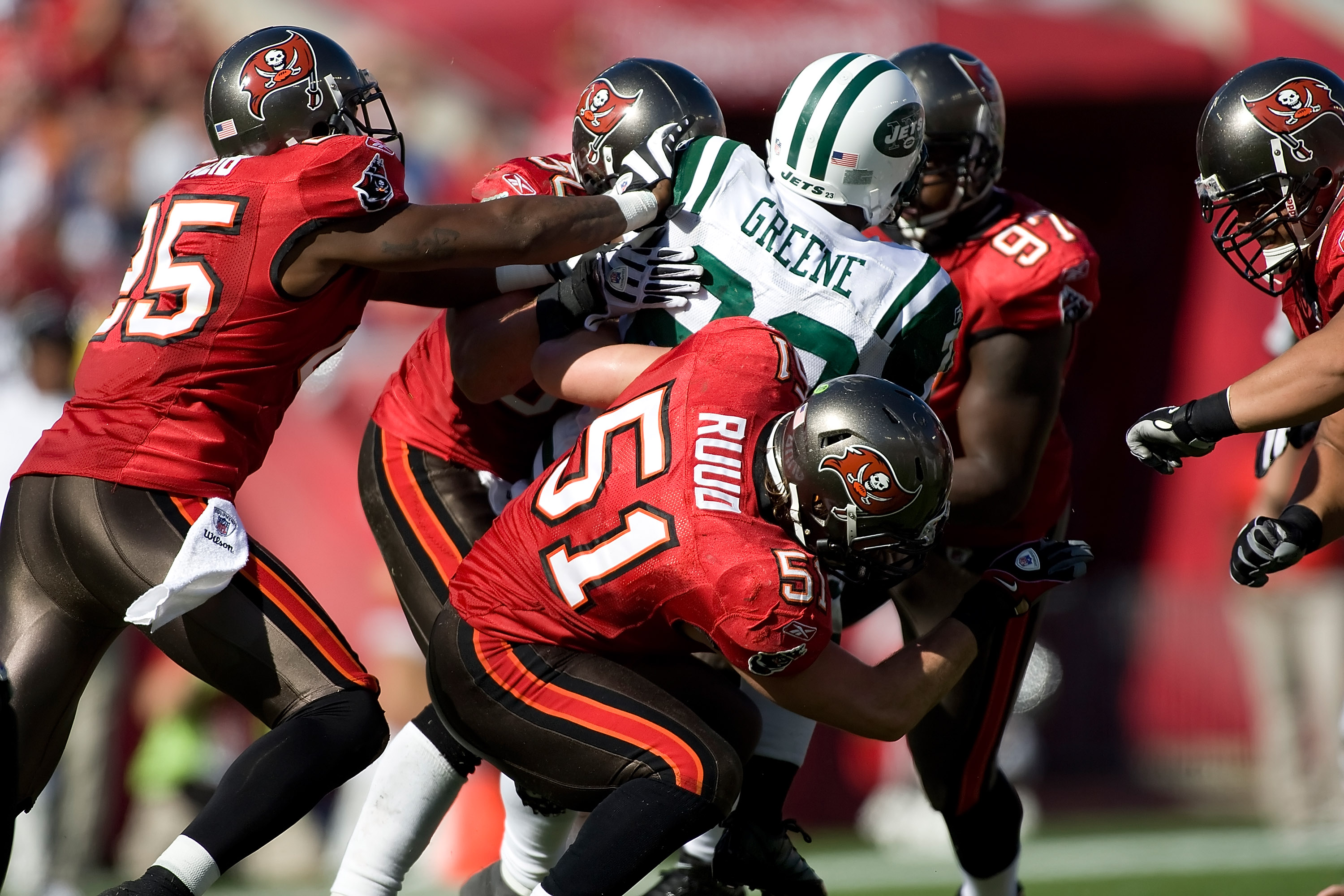 TAMPA, FL - DECEMBER 13:  Running back Shonn Greene #23 of the New York Jets is tackled by Barrett Ruud #51 of the Tampa Bay Buccaneers during the game at Raymond James Stadium on December 13, 2009 in Tampa, Florida.  (Photo by J. Meric/Getty Images)