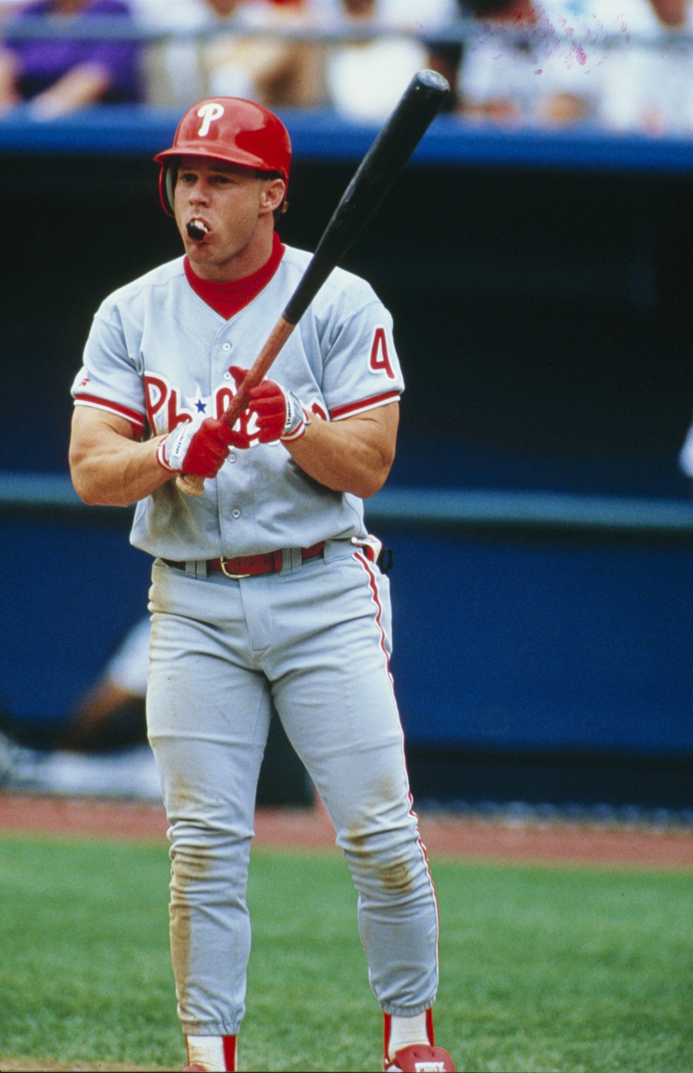 DENVER - AUGUST 19:  Lenny Dykstra of the Philadelphia Phillies steps to the plate with chewing tobacco visible in his mouth during the game against the Colorado Rockies at Mile High Stadium on August 19, 1993 in Denver, Colorado. (Photo by Tim Defrisco/G