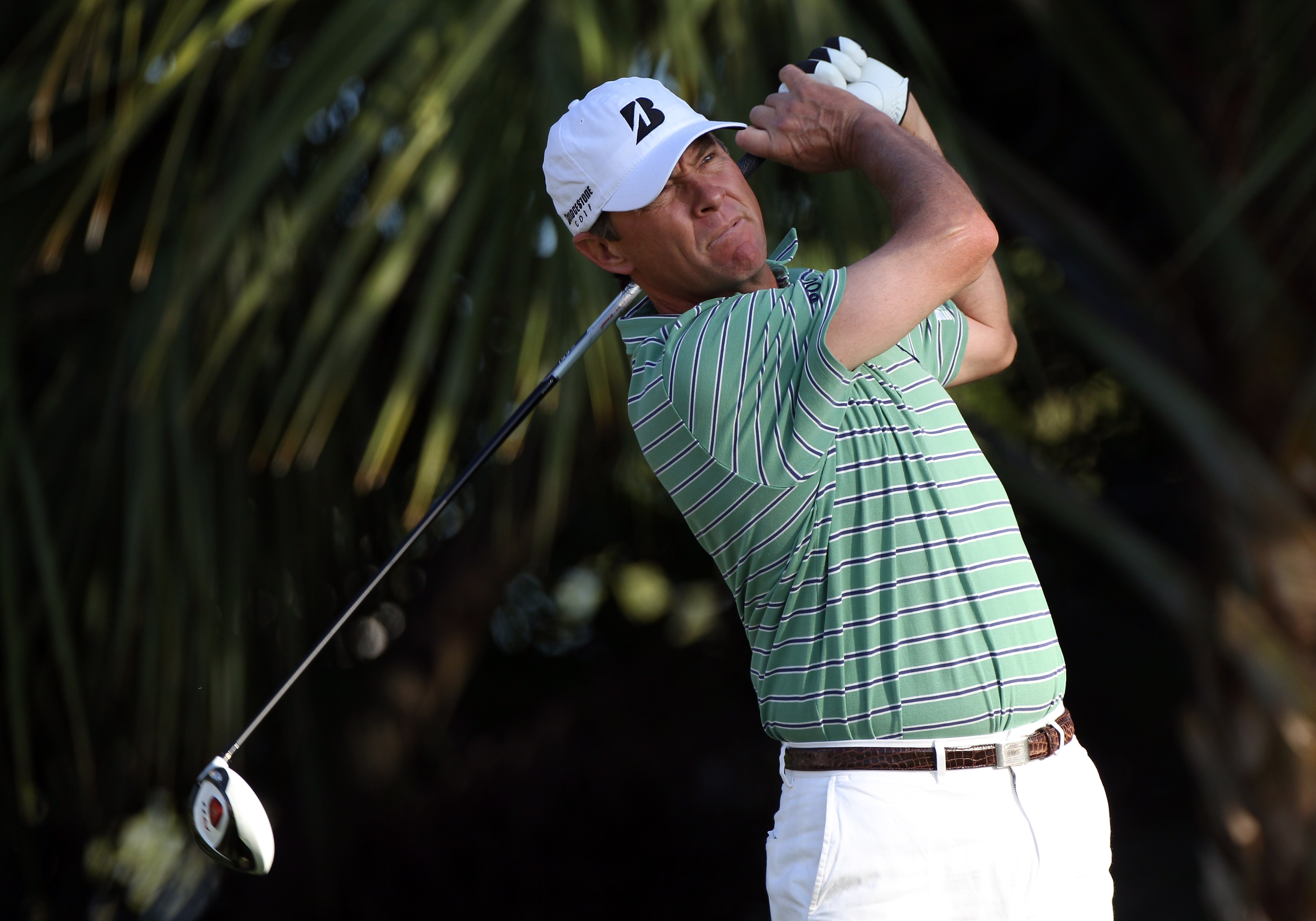 PALM BEACH GARDENS, FL - MARCH 04:  Davis Love III hits a shot during the second round of The Honda Classic at PGA National Resort and Spa on March 4, 2011 in Palm Beach Gardens, Florida.  (Photo by Sam Greenwood/Getty Images)