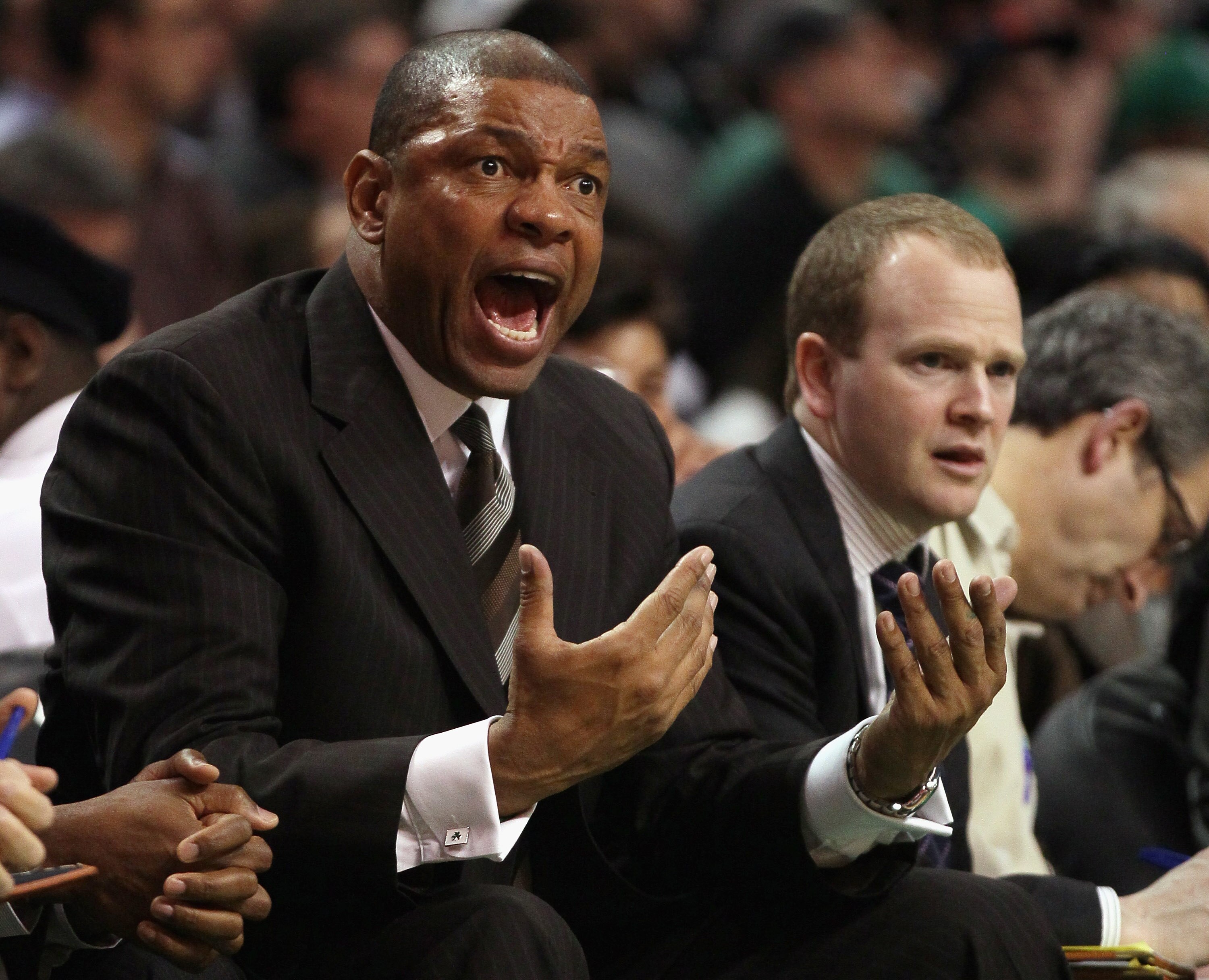 BOSTON, MA - MARCH 09:  Doc Rivers of the Boston Celtics directs his players from the bench in the second half against the Los Angeles Clippers on March 9, 2011 at the TD Garden in Boston, Massachusetts. The Los Angeles Clippers defeated the Boston Celtic