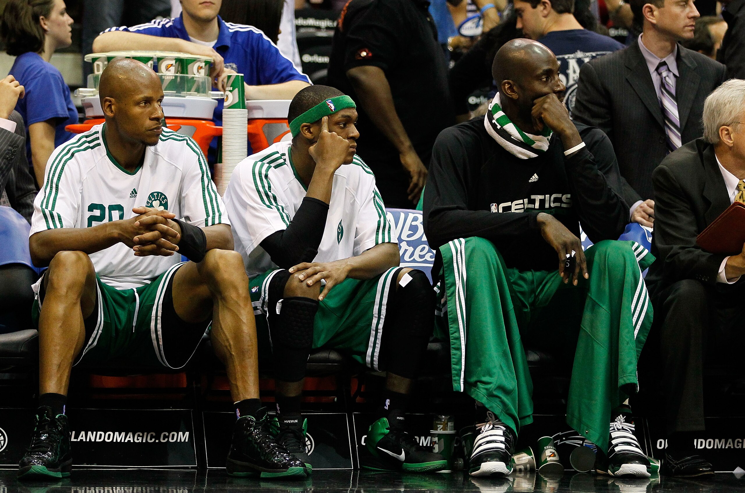 ORLANDO, FL - MAY 26:  (L-R) Ray Allen #20, Rajon Rondo #9 and Keivn Garnett #5 of the Boston Celtics look on dejected from the bench in the final minutes of their 113-92 loss to the Orlando Magic in Game Five of the Eastern Conference Finals during the 2