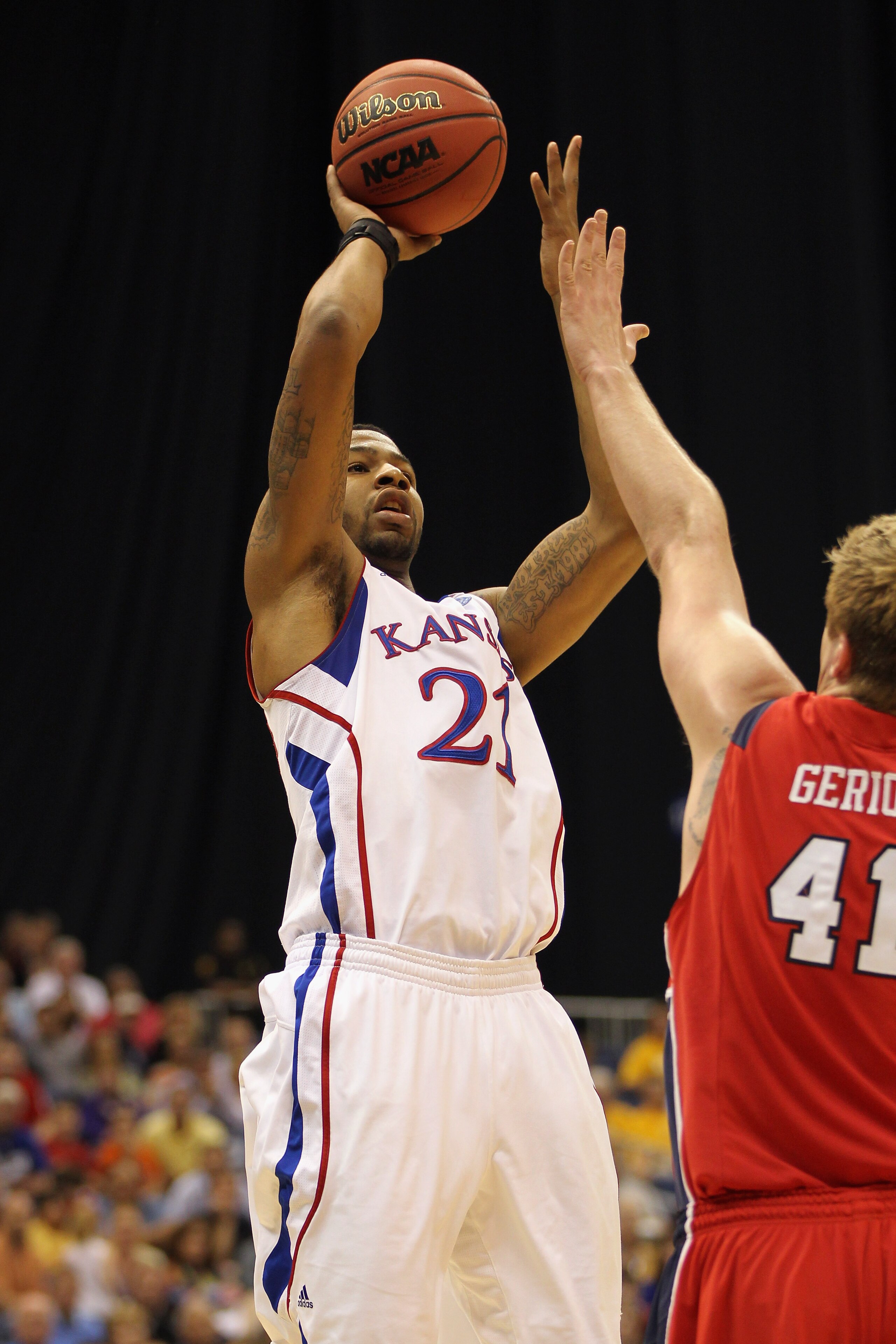 SAN ANTONIO, TX - MARCH 25: Markieff Morris #21 of the Kansas Jayhawks puts up a shot against the Richmond Spiders during the southwest regional of the 2011 NCAA men's basketball tournament at the Alamodome on March 25, 2011 in San Antonio, Texas. (Phot SAN ANTONIO, TX - MARCH 25: Markieff Morris #21 of the Kansas Jayhawks puts up a shot against the Richmond Spiders during the southwest regional of the 2011 NCAA men's basketball tournament at the Alamodome on March 25, 2011 in San Antonio, Texas. (Phot