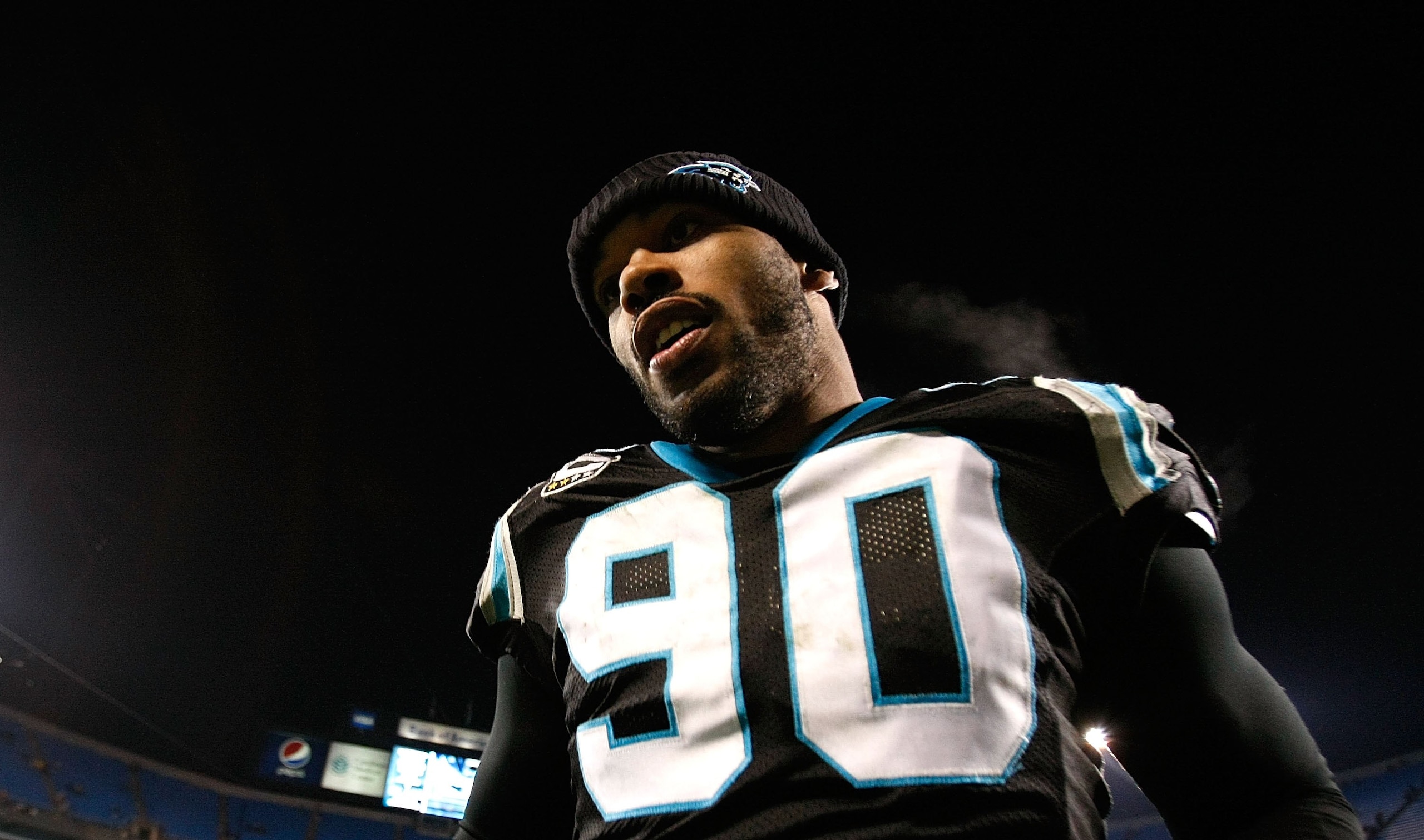 CHARLOTTE, NC - DECEMBER 20:  Julius Peppers #90 of the Carolina Panthers against the Minnesota Vikings at Bank of America Stadium on December 20, 2009 in Charlotte, North Carolina.  (Photo by Kevin C. Cox/Getty Images)