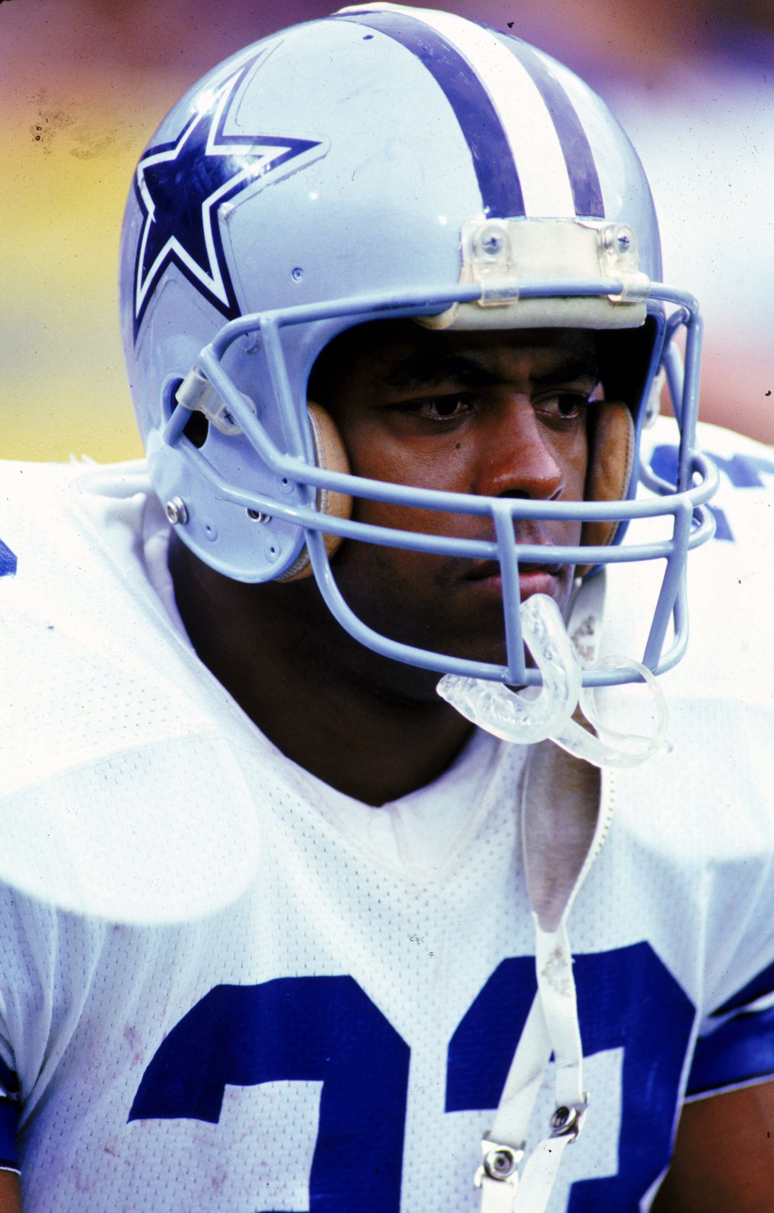 Running back Tony Dorsett #33 of the Dallas Cowboys looks on during a game.
