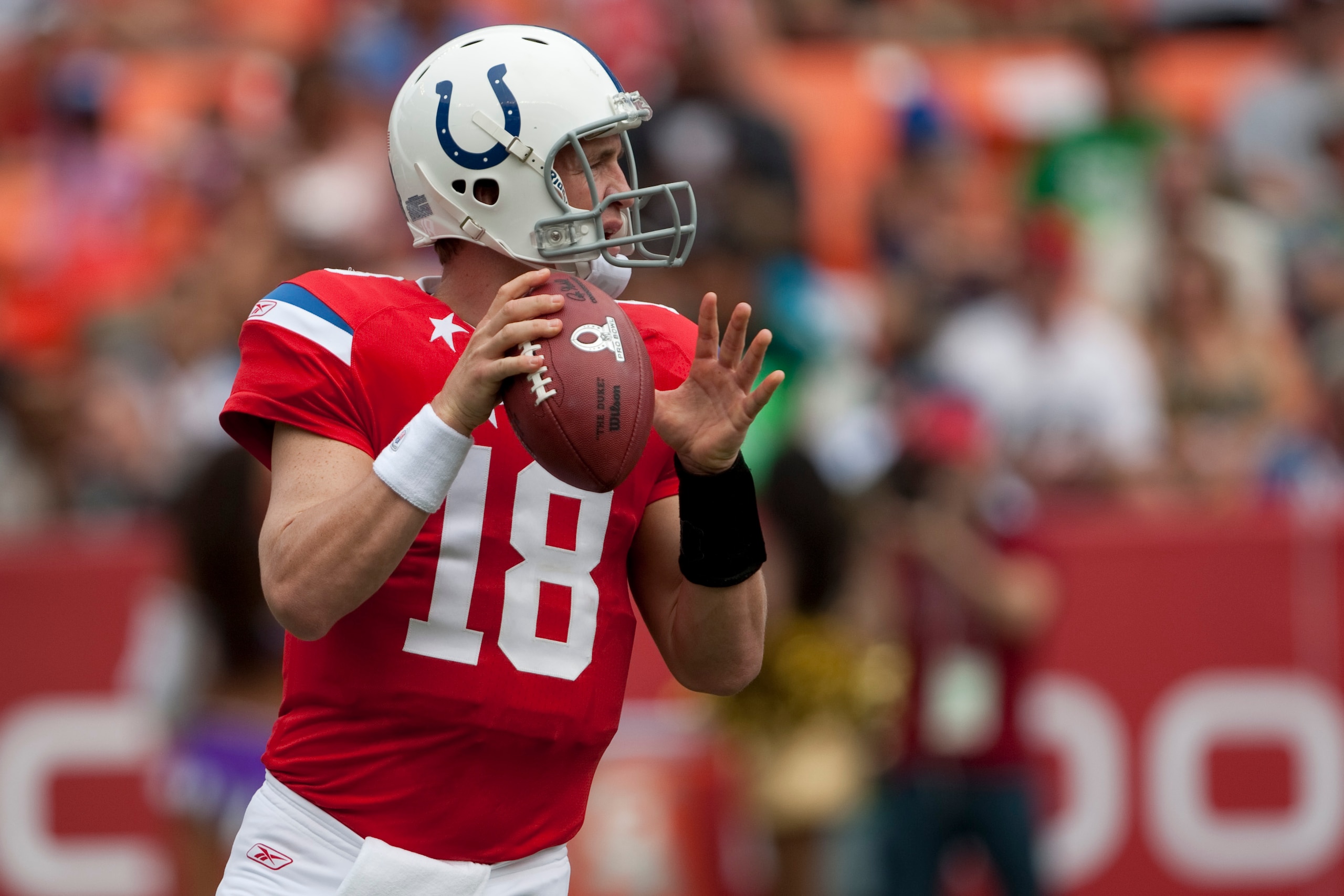 HONOLULU - JANUARY 30:  Peyton Manning, #18 of the Indianapolis Colts, passes against the NFC team during the 2011 NFL Pro Bowl at Aloha Stadium on January 30, 2011 in Honolulu, Hawaii.  (Photo by Kent Nishimura/Getty Images)