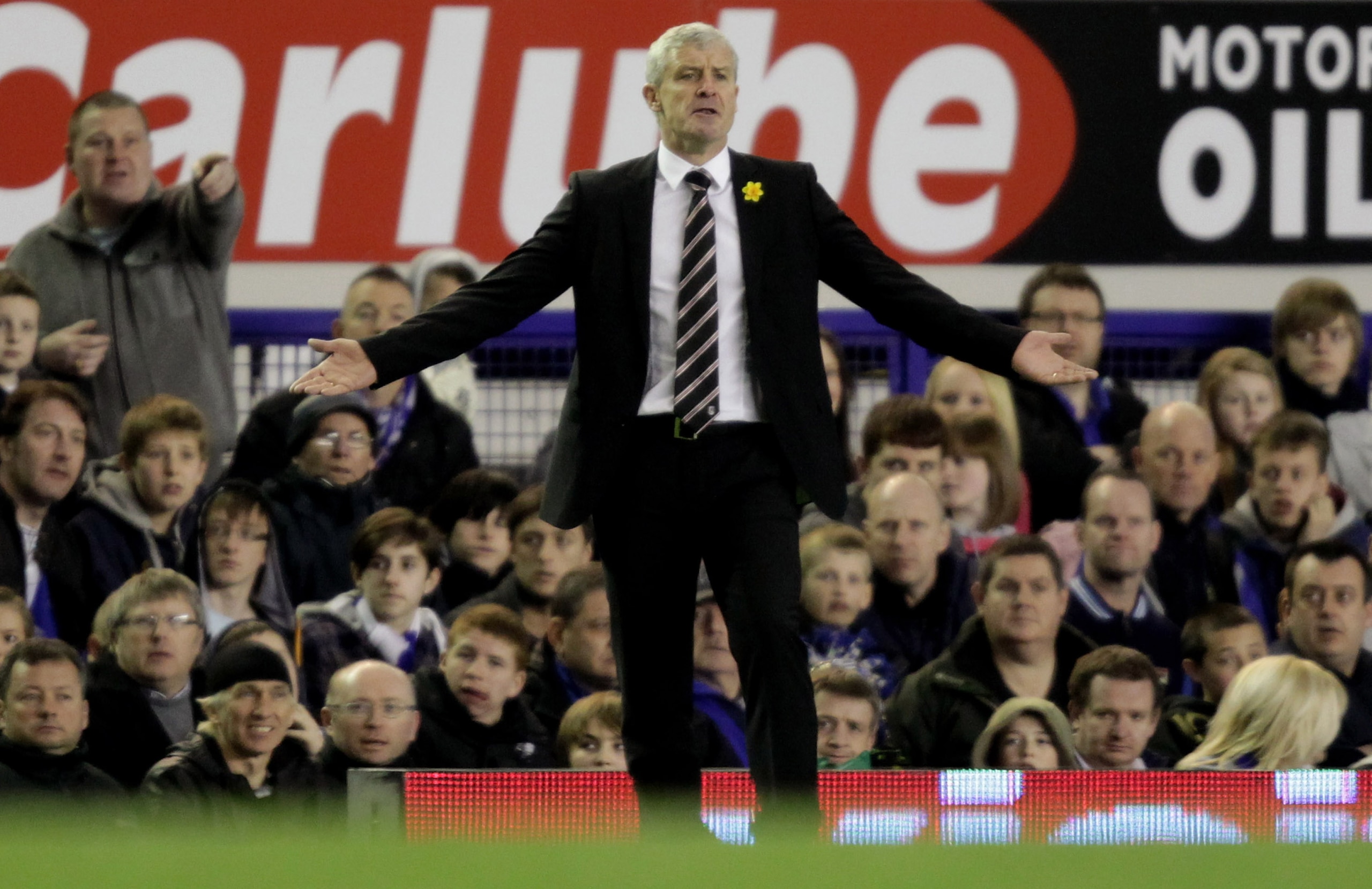LIVERPOOL, ENGLAND - MARCH 19:  Fulham Manager Mark Hughes reacts during the Barclays Premier League match between Everton and Fulham at Goodison Park on March 19, 2011 in Liverpool, England.  (Photo by Ross Kinnaird/Getty Images)