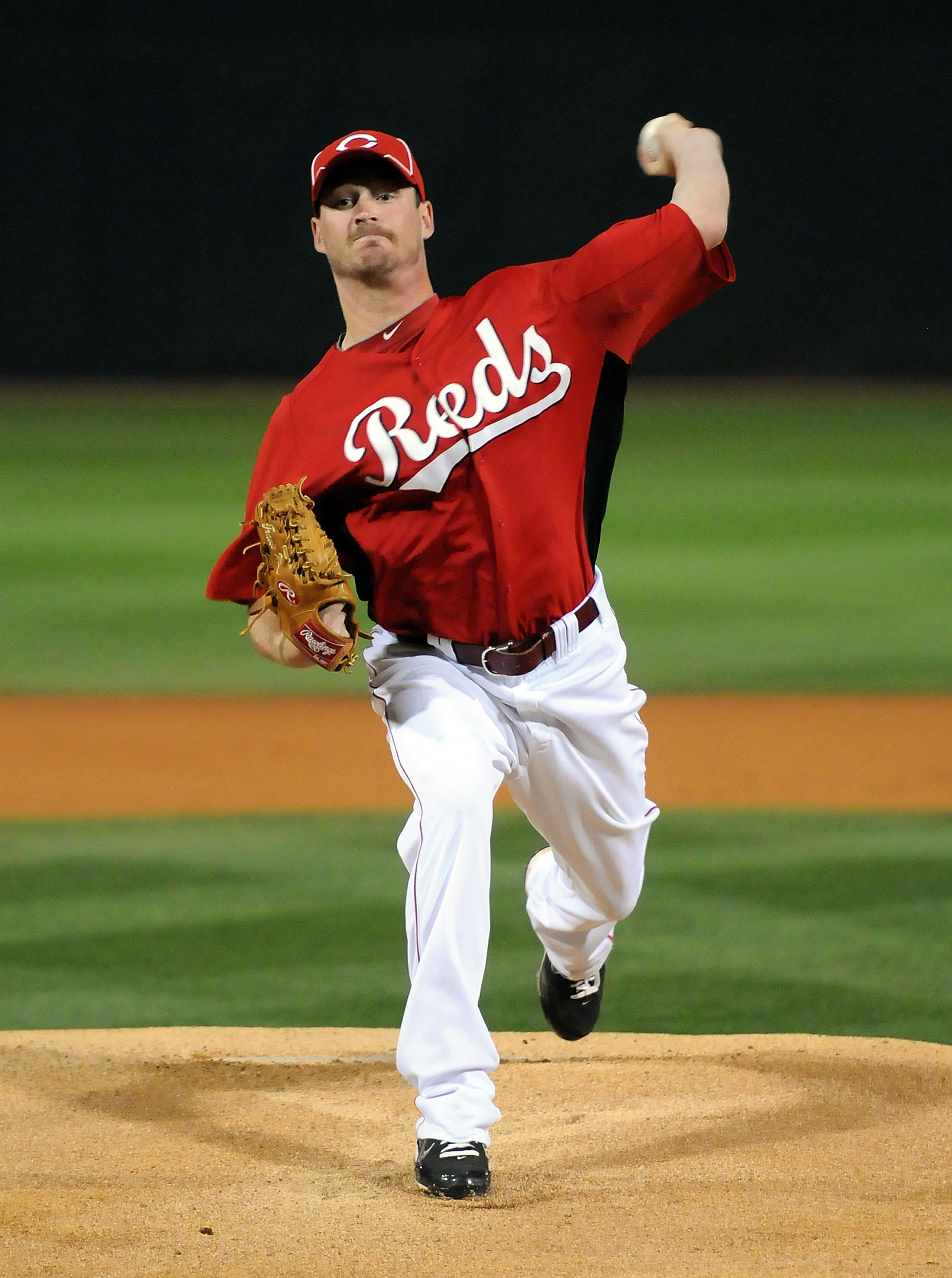 GOODYEAR, AZ - MARCH 03:  Travis Wood #30 of the Cincinnati Reds delivers a pitch against the Los Angeles Dodgers at Goodyear Ballpark on March 3, 2011 in Goodyear, Arizona.  (Photo by Norm Hall/Getty Images)