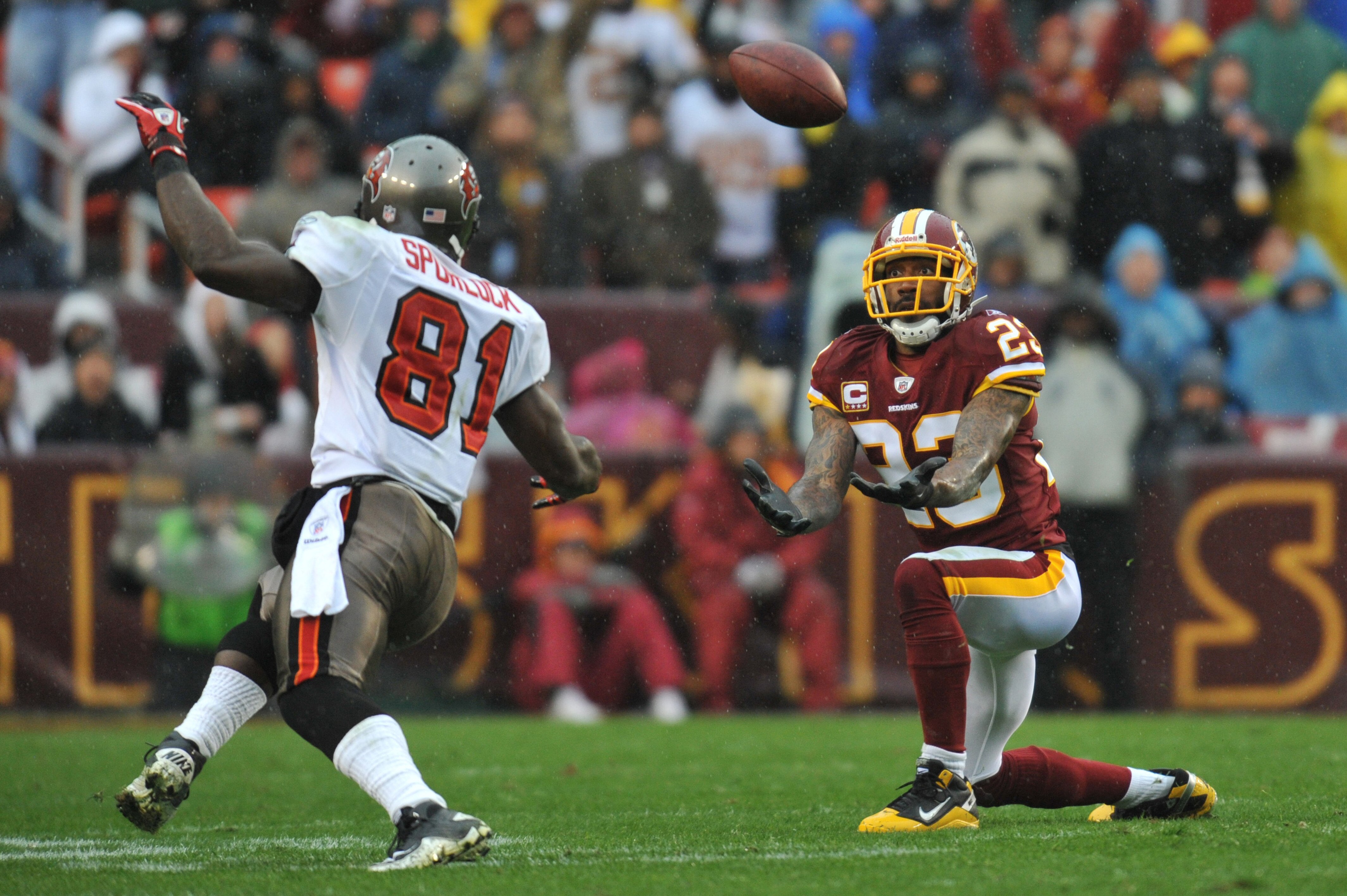 LANDOVER, MD - DECEMBER 12: DeAngelo Hall #23 of the Washington Redskins tries for an interception against the Tampa Bay Buccaneers at FedExField on December 12, 2010 in Landover, Maryland. The Buccaneers defeated the Redskins 17-16. (Photo by Larry Fre LANDOVER, MD - DECEMBER 12: DeAngelo Hall #23 of the Washington Redskins tries for an interception against the Tampa Bay Buccaneers at FedExField on December 12, 2010 in Landover, Maryland. The Buccaneers defeated the Redskins 17-16. (Photo by Larry Fre