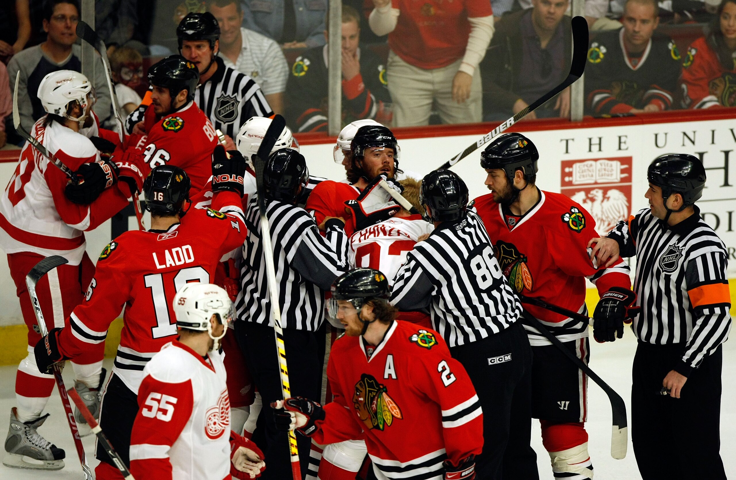 CHICAGO - MAY 24:  Officals attempt to seperate players as Martin Havlat #24 (C) of the Chicago Blackhawks fights with Johan Franzen #93 of the Detroit Red Wings during Game Four of the Western Conference Championship Round of the 2009 Stanley Cup Playoff