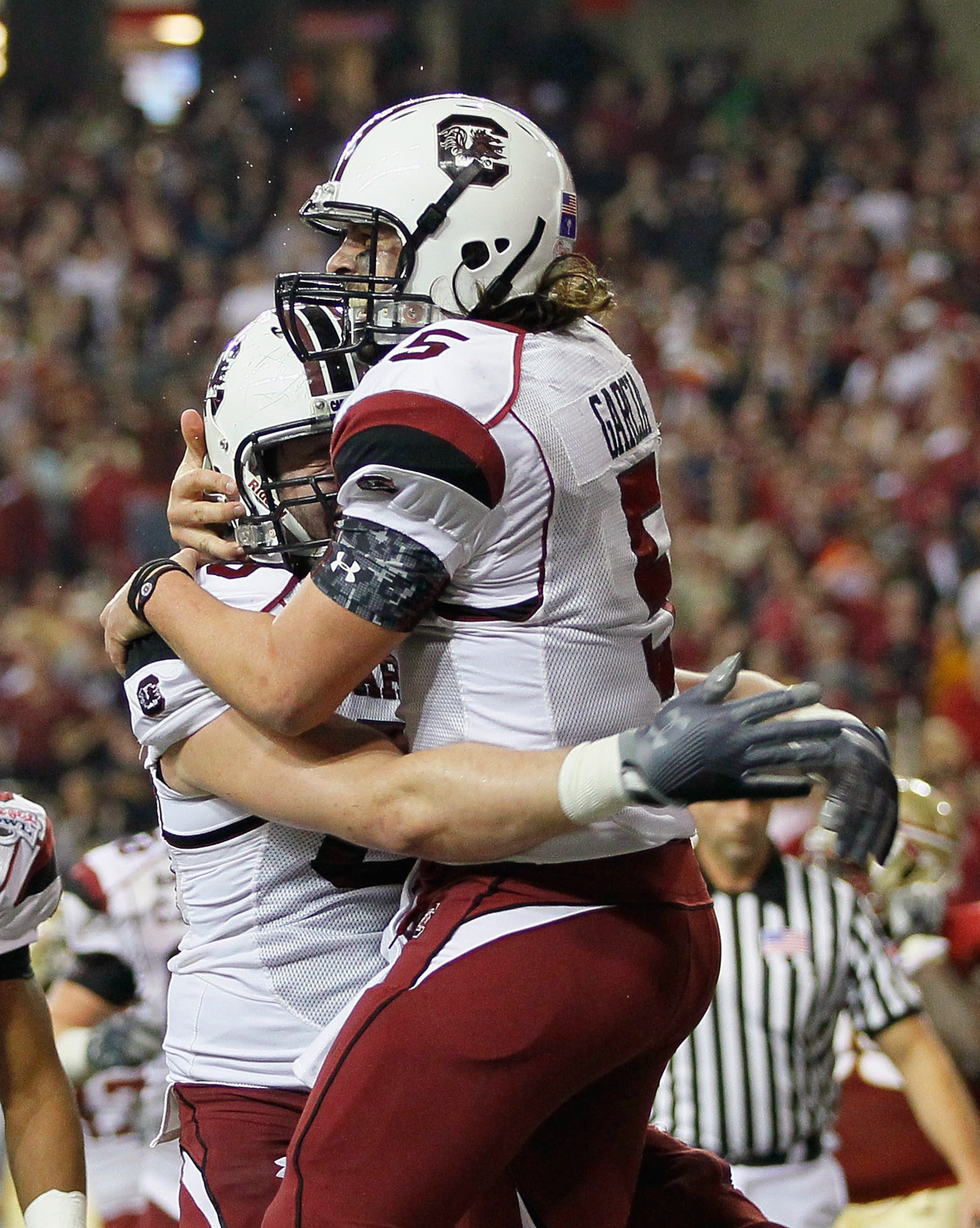 ATLANTA, GA - DECEMBER 31:  Quarterback Stephen Garcia #5 of the South Carolina Gamecocks reacts after scoring a touchdown against the Florida State Seminoles with Hutch Eckerson #66 during the 2010 Chick-fil-A Bowl at Georgia Dome on December 31, 2010 in