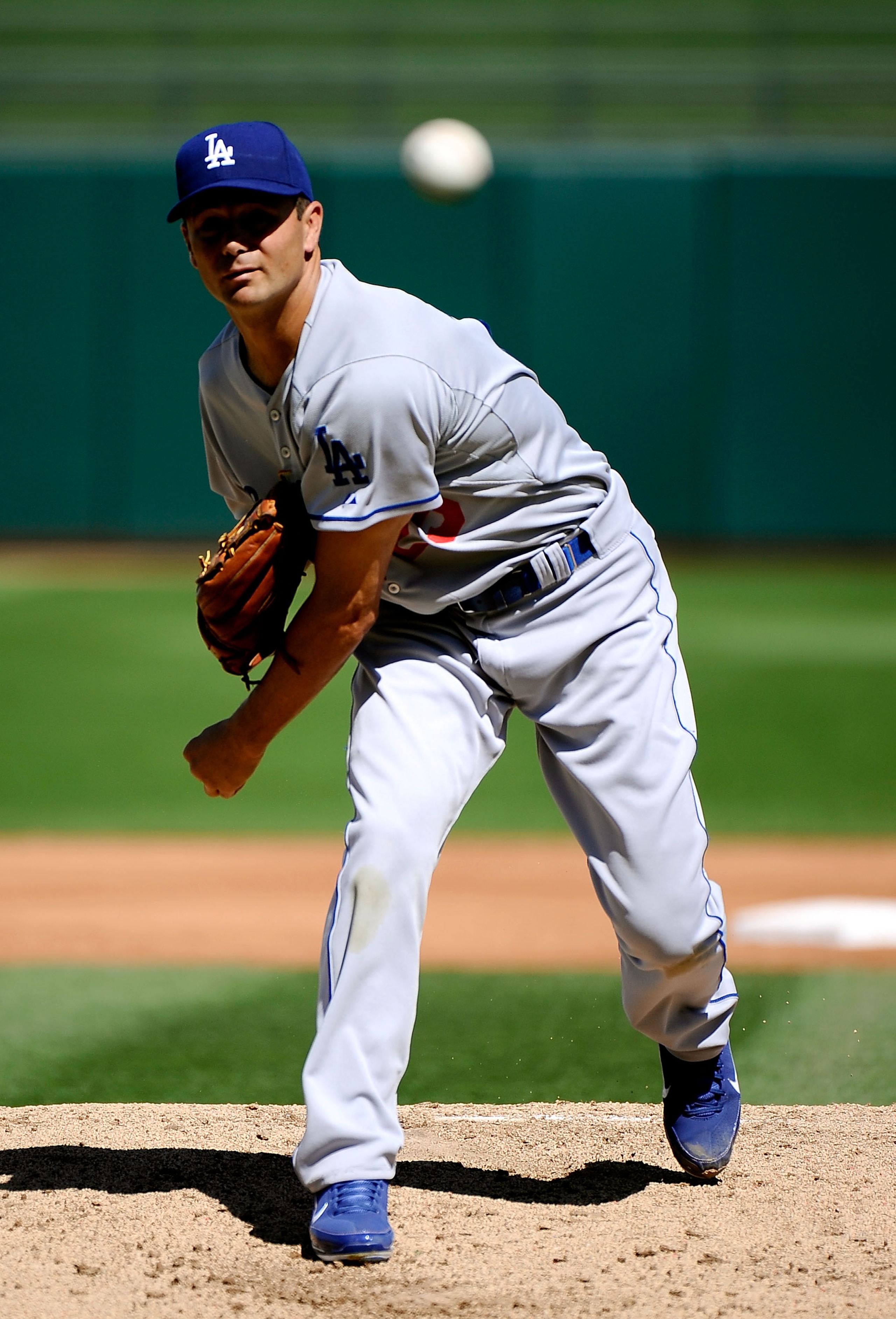 SURPRISE, AZ - MARCH 12:  Pitcher Ted Lilly #29 of the the Los Angeles Dodgers  throws a pitch during the spring training baseball game against the Kansas City Royals at Surprise Stadium on March 12, 2011 in Surprise, Arizona.  (Photo by Kevork Djansezian