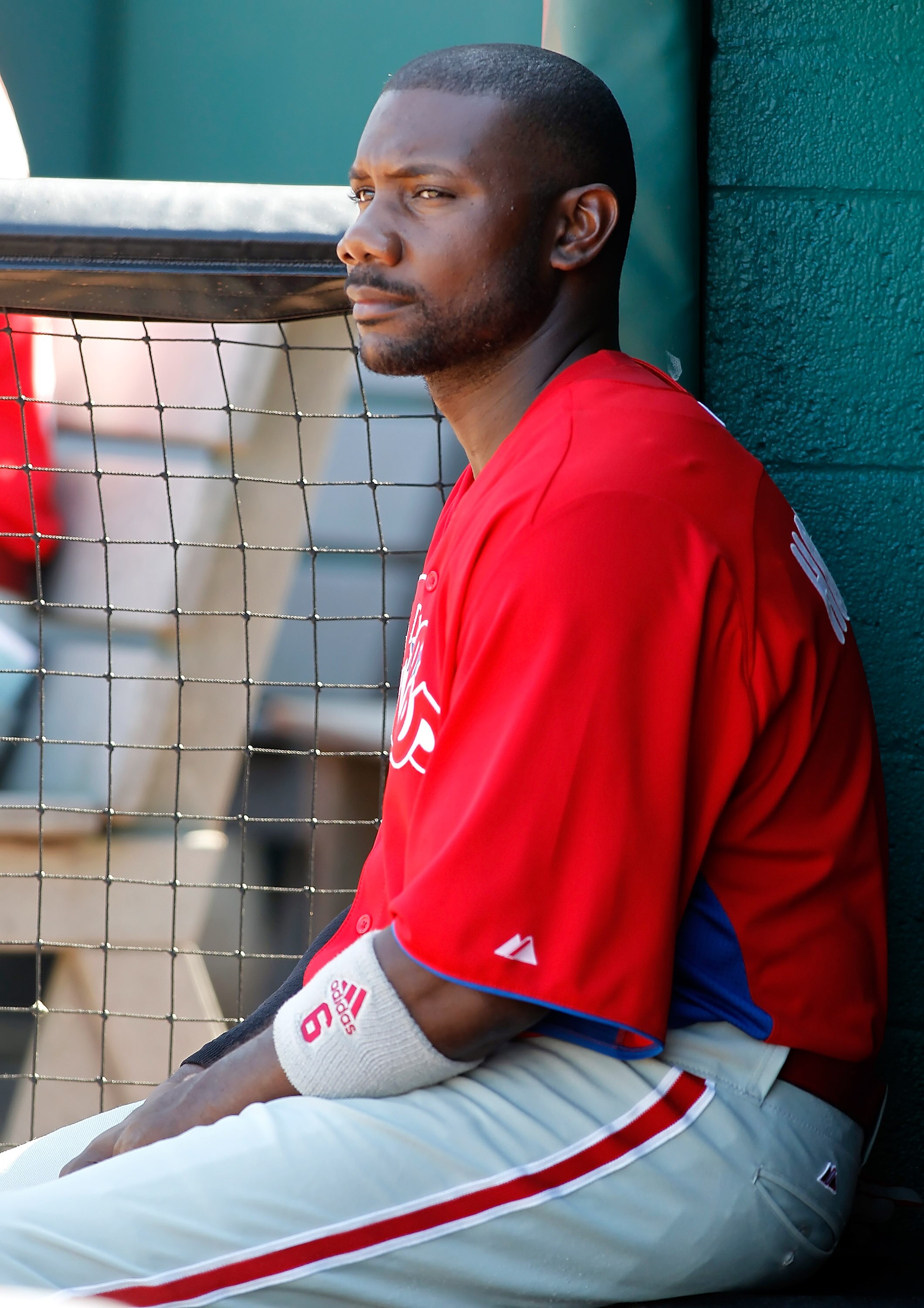 BRADENTON, FL - MARCH 12:  Infielder Ryan Howard #6 of the Philadelphia Phillies sits in the dugout during a Grapefruit League Spring Training Game against the Pittsburgh Pirates at McKechnie Field on March 12, 2011 in Bradenton, Florida.  (Photo by J. Me