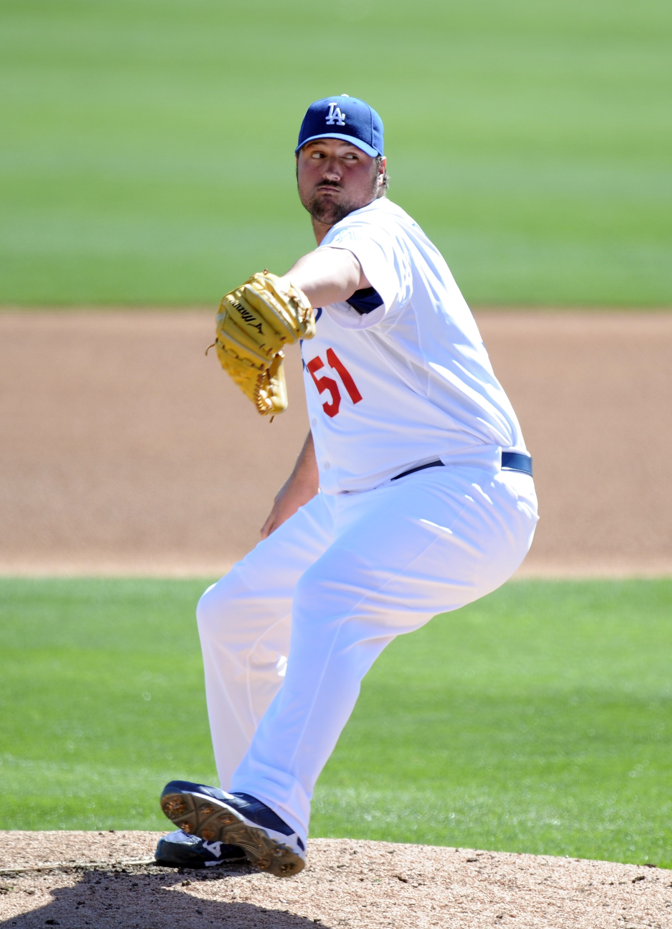 PHOENIX, AZ - FEBRUARY 28:  Jonathan Broxton #51 of the Los Angeles Dodgers pitches during spring training at Camelback Ranch on February 28, 2011 in Phoenix, Arizona.  (Photo by Harry How/Getty Images)