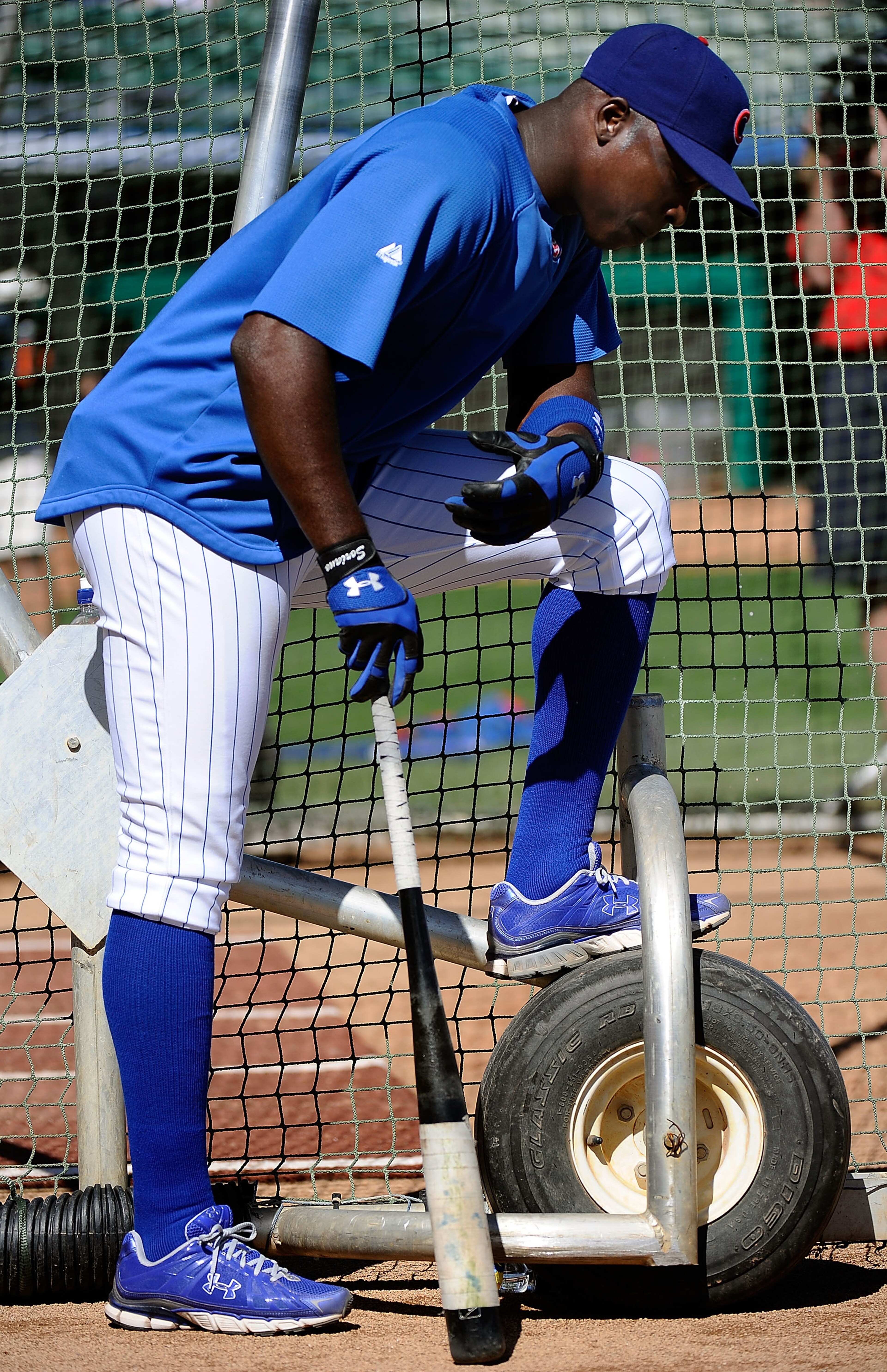 MESA, AZ - MARCH 09:  Alfonso Soriano #12 of the Chicago Cubs attends batting practice before the spring training baseball game against the Kansas City Royals at HoHoKam Stadium on March 9, 2011 in Mesa, Arizona.  (Photo by Kevork Djansezian/Getty Images)