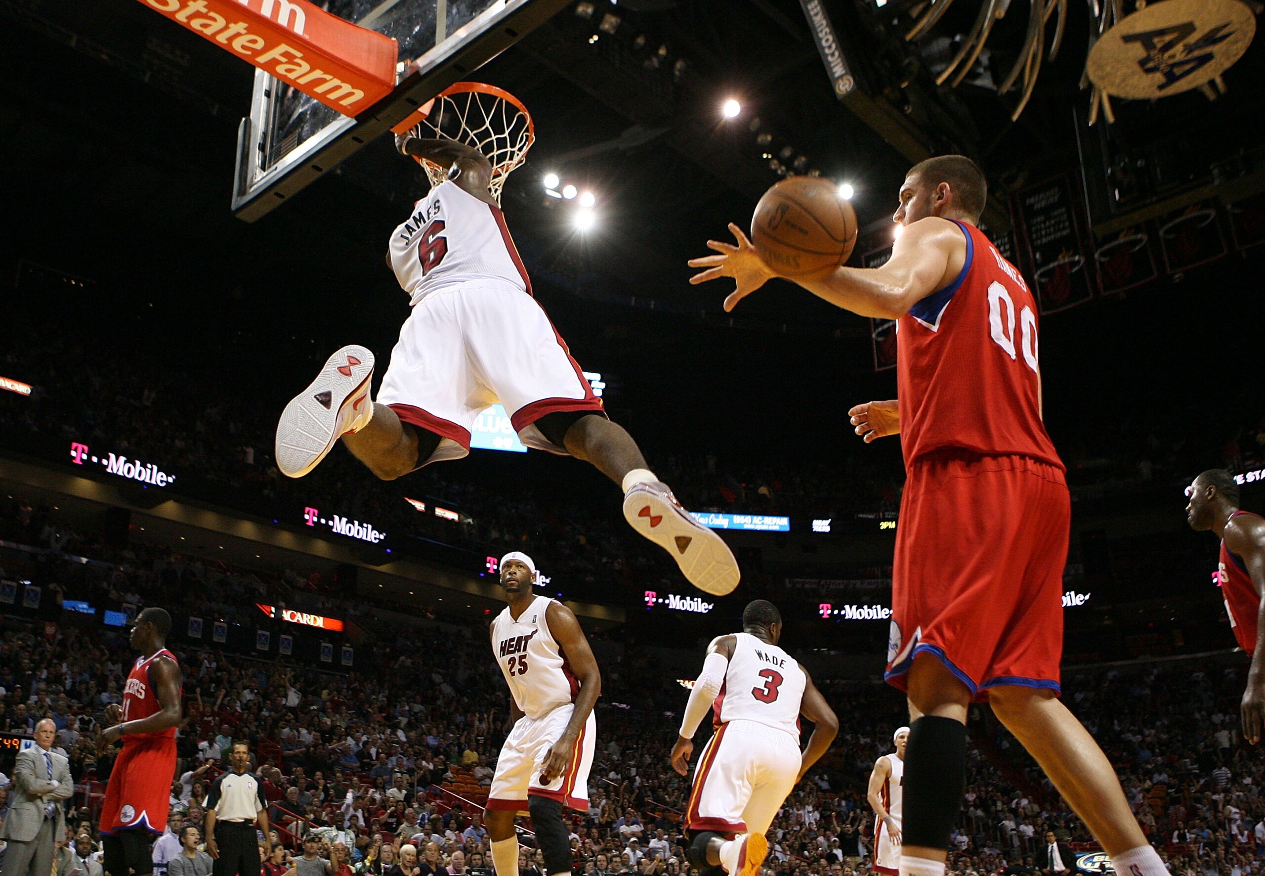 MIAMI, FL - MARCH 25:  Forward LeBron James #6 of the Miami Heat dunks againts the Philadelphia Sixers at American Airlines Arena on March 25, 2011 in Miami, Florida. The Heat defeated the Sixers 111-99.  NOTE TO USER:  User expressly acknowledges and agr