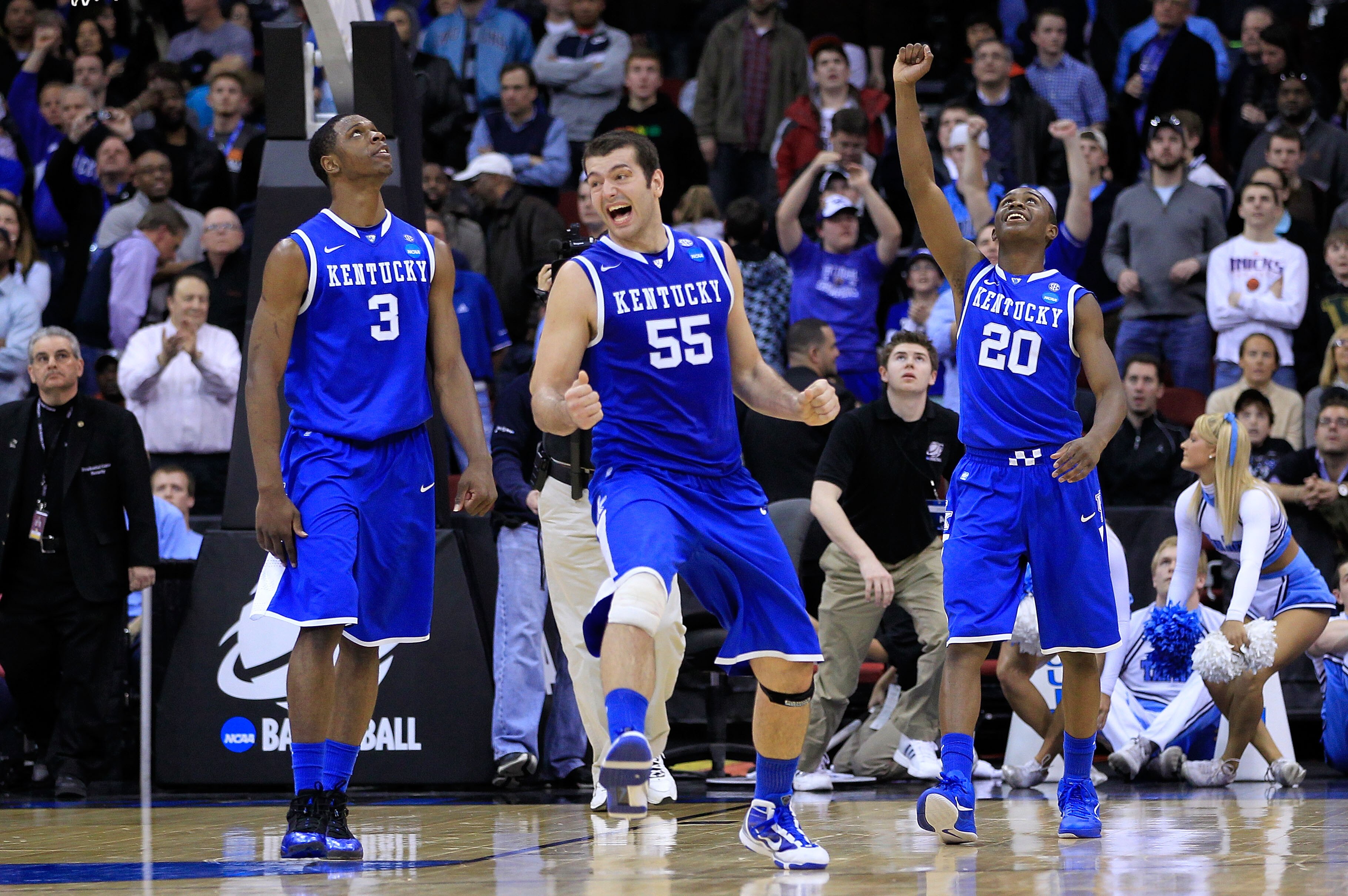NEWARK, NJ - MARCH 27:  Josh Harrellson #55, Terrence Jones #3 and Doron Lamb #20 of the Kentucky Wildcats celebrate their win against the North Carolina Tar Heels in the east regional final of the 2011 NCAA men's basketball tournament at Prudential Cente