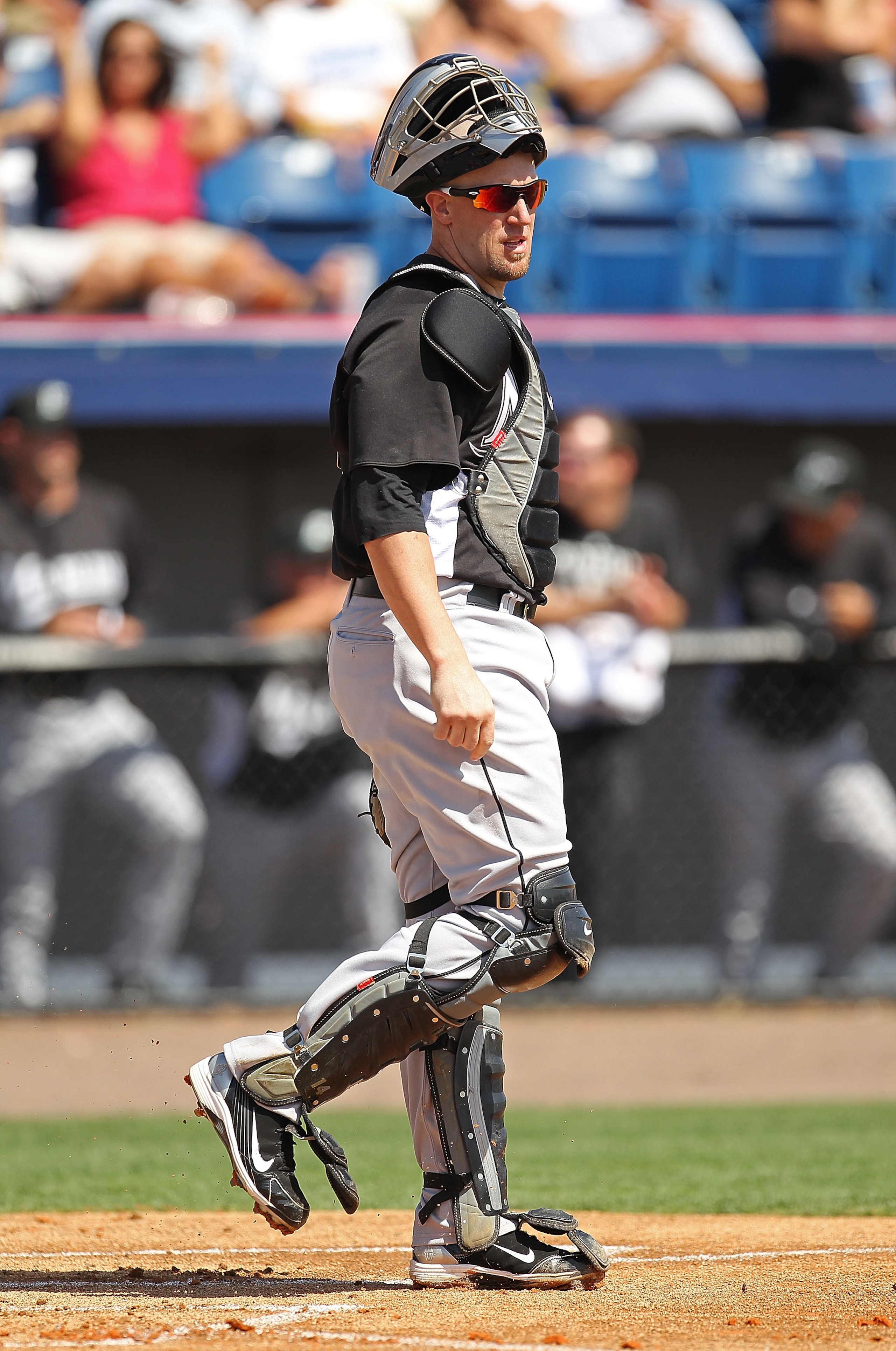 VIERA, FL - MARCH 02: John Buck #14 of the Florida Marlins looks on during a Spring Training game against the Washington Nationals at Space Coast Stadium on March 2, 2011 in Viera, Florida.  (Photo by Mike Ehrmann/Getty Images)