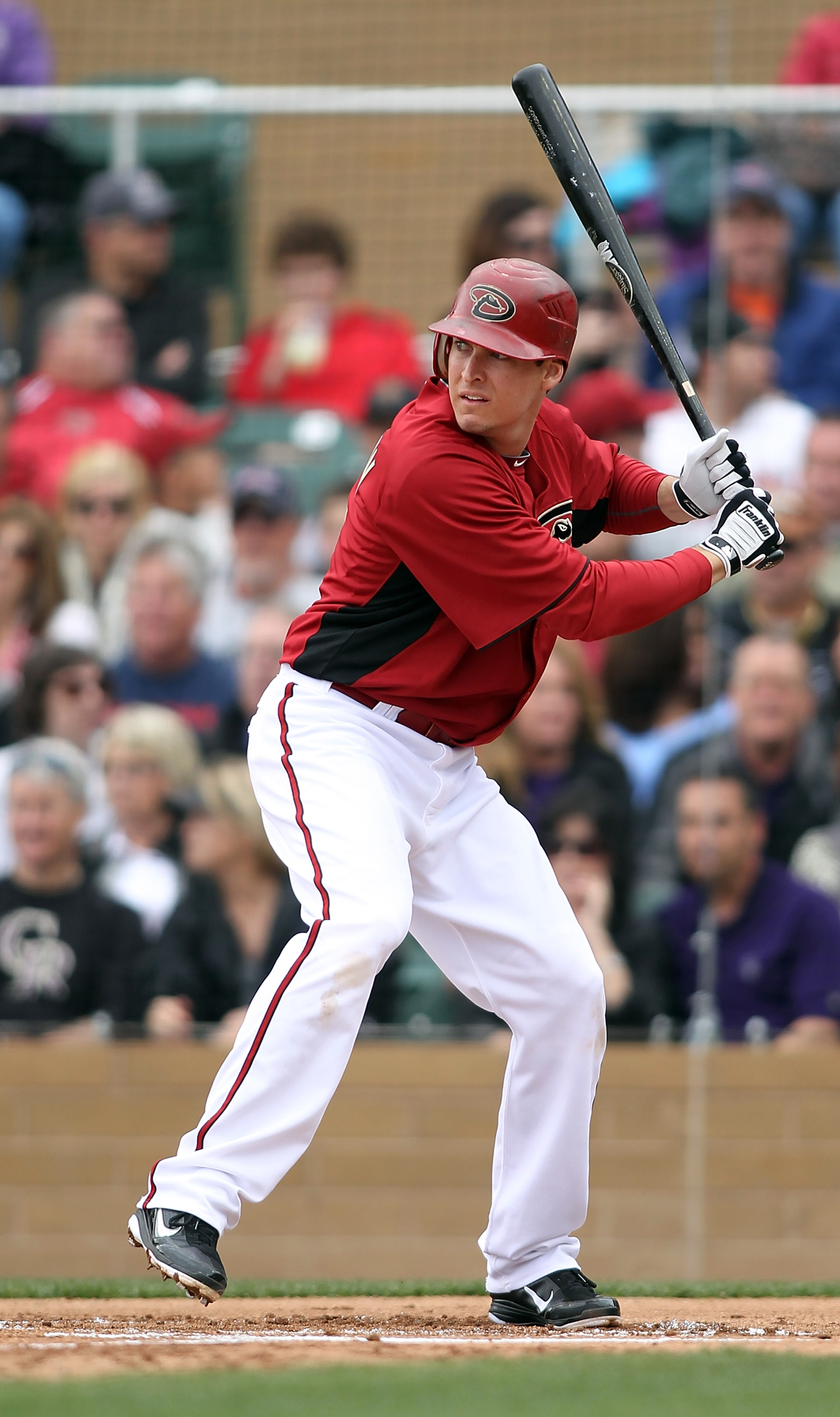 SCOTTSDALE, AZ - FEBRUARY 26:  Kelly Johnson #2 of the Arizona Diamondbacks swings his bat against the Colorado Rockies at Salt River Fields on February 26, 2011 in Scottsdale, Arizona..  (Photo by Jonathan Ferrey/Getty Images)
