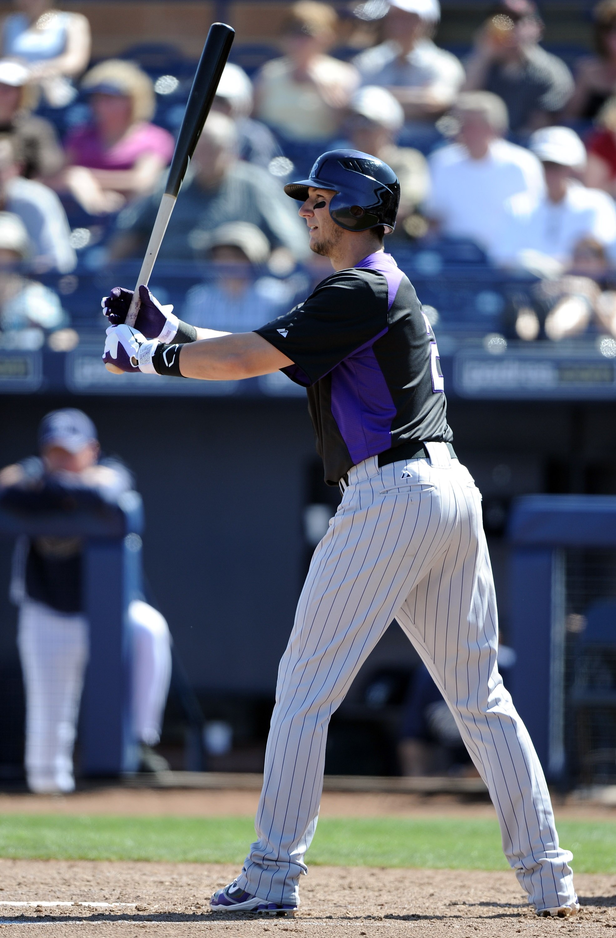 PEORIA, AZ - MARCH 02:  Troy Tulowitzki #2 of the Colorado Rockies at bat against the San Diego Padres during spring training at Peoria Stadium on March 2, 2011 in Peoria, Arizona.  (Photo by Harry How/Getty Images)