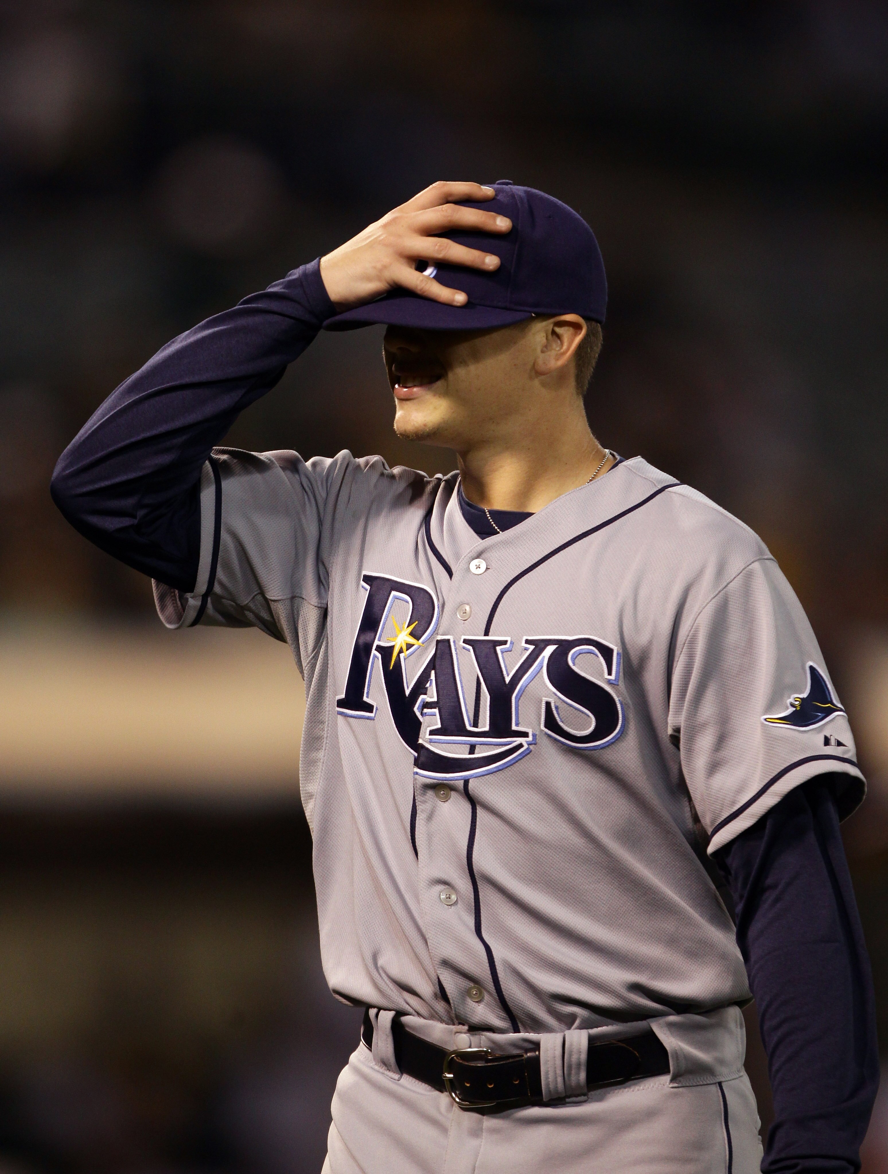 OAKLAND, CA - AUGUST 20:  Jeremy Hellickson #58 of the Tampa Bay Rays walks off the field after the sixth inning in which he gave up a home run to tie their game against the Oakland Athletics at the Oakland-Alameda County Coliseum  on August 20, 2010 in O
