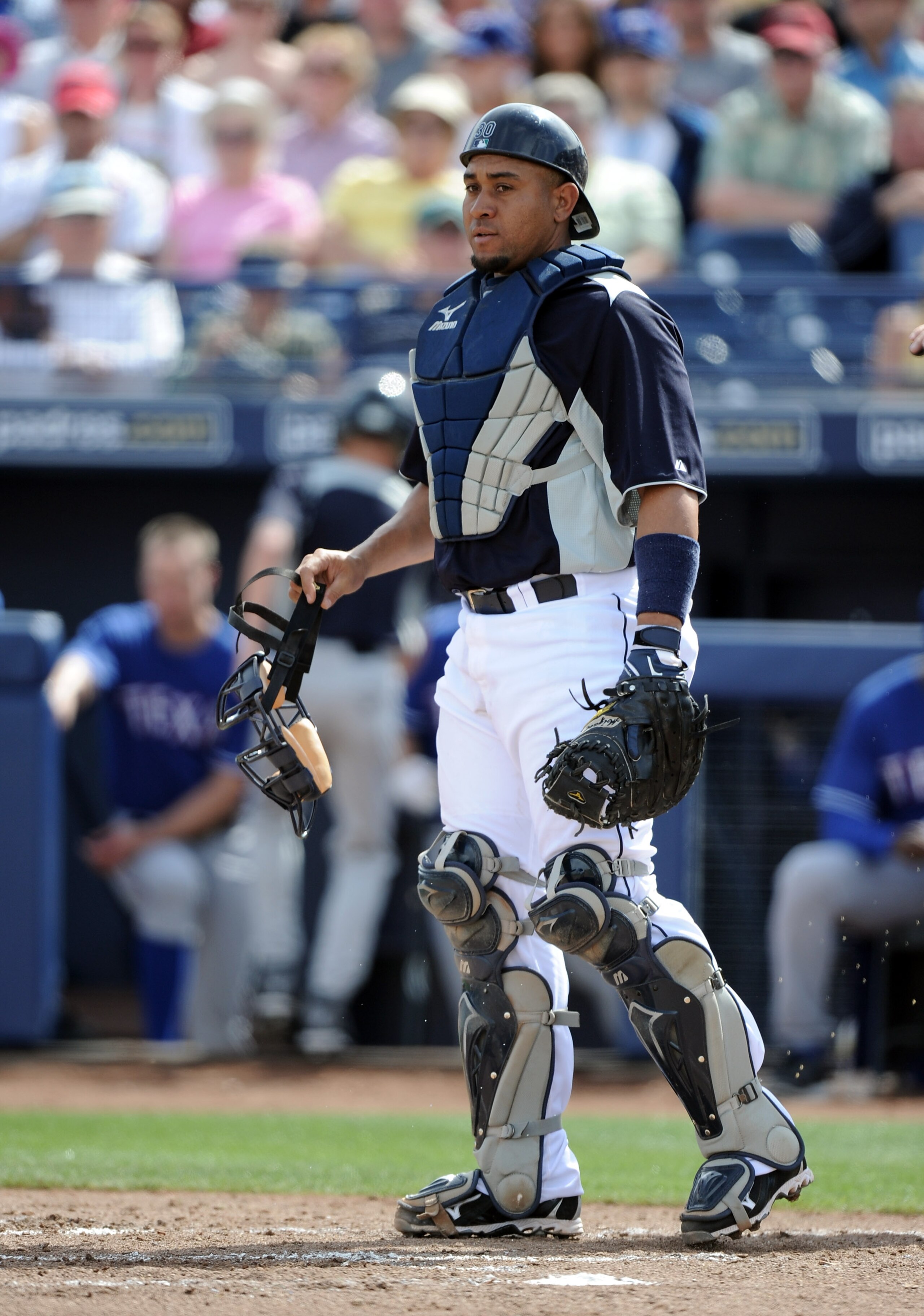 PEORIA, AZ - MARCH 01:  Miguel Olivo #30 of the Seattle Mariners watches play during spring training at Peoria Stadium on March 1, 2011 in Peoria, Arizona.  (Photo by Harry How/Getty Images)